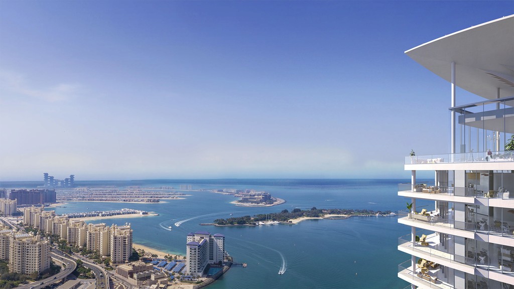 Palm Beach Tower 2, a stylish residential building, rises prominently with a backdrop of palm trees and sunny skies.