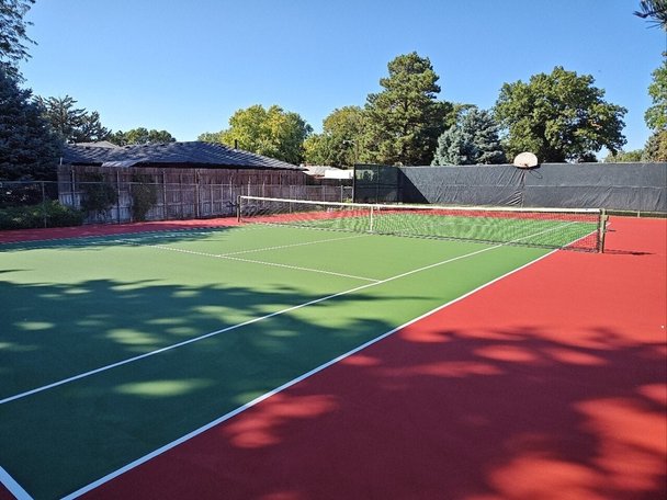 Newly resurfaced and painted tennis court 