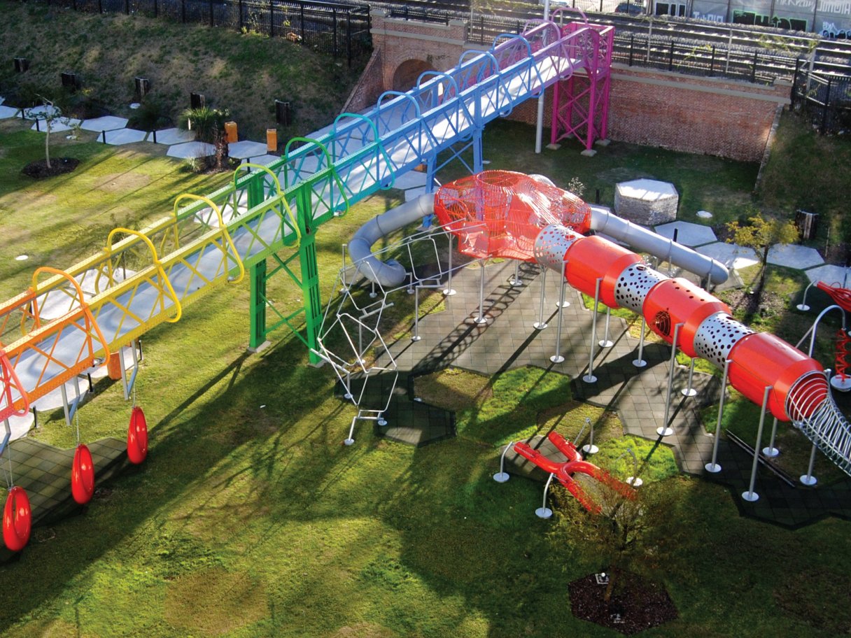 Rustic cabin in a golden field at sunset