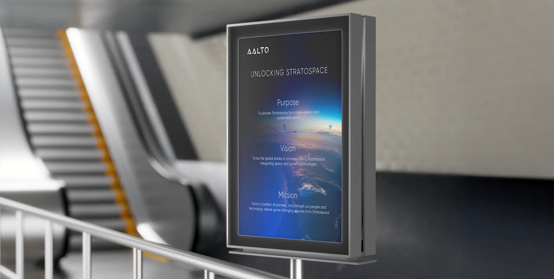 Framed wall display showing AALTO's Purpose, Vision, and Mission statements with stratosphere background imagery