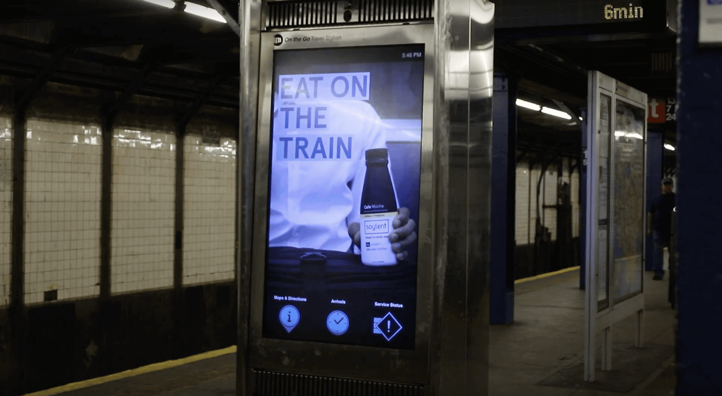 Digital kiosk in NYC subway showing a Soylent ad