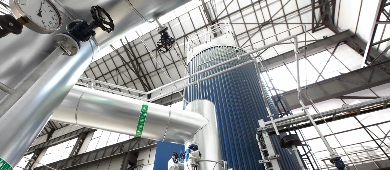 windmill on grass field during golden hour