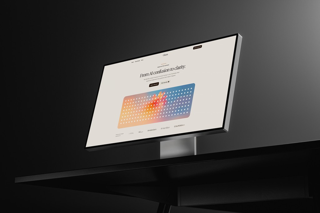A digital display screen showing colorful graphics, positioned on a sleek black surface.