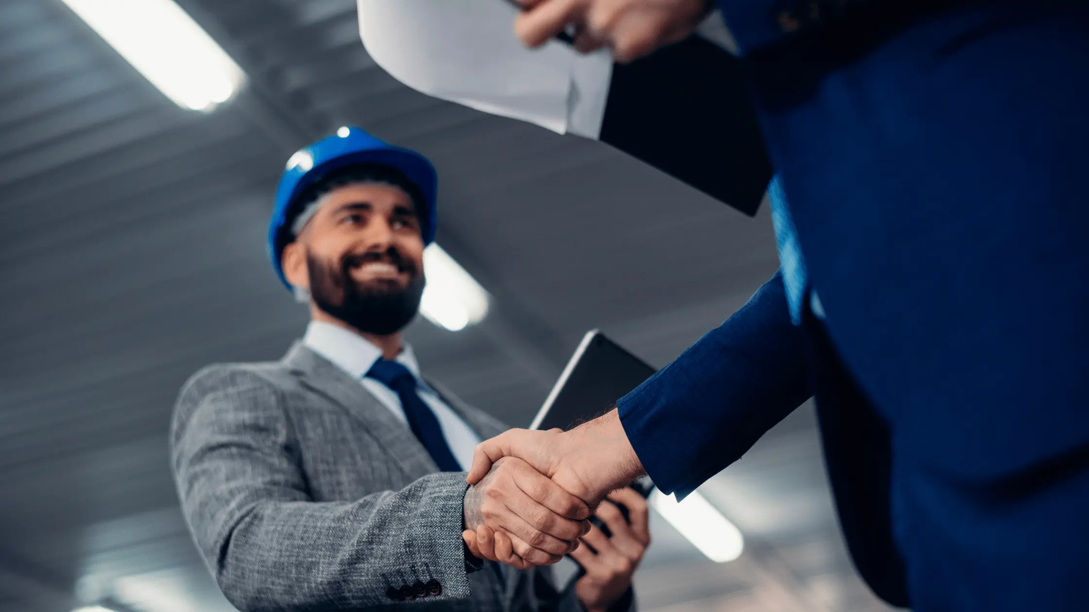 Managers having a discussion on workplace operations, image