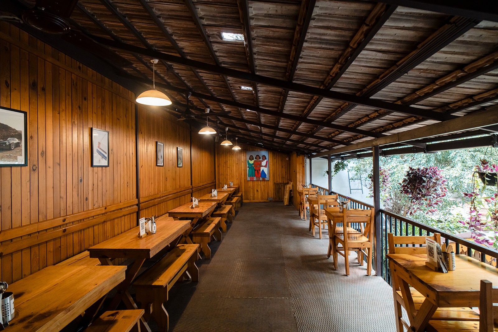 Cafe seating and art decor inside DYU Art Cafe Koramangala Bangalore