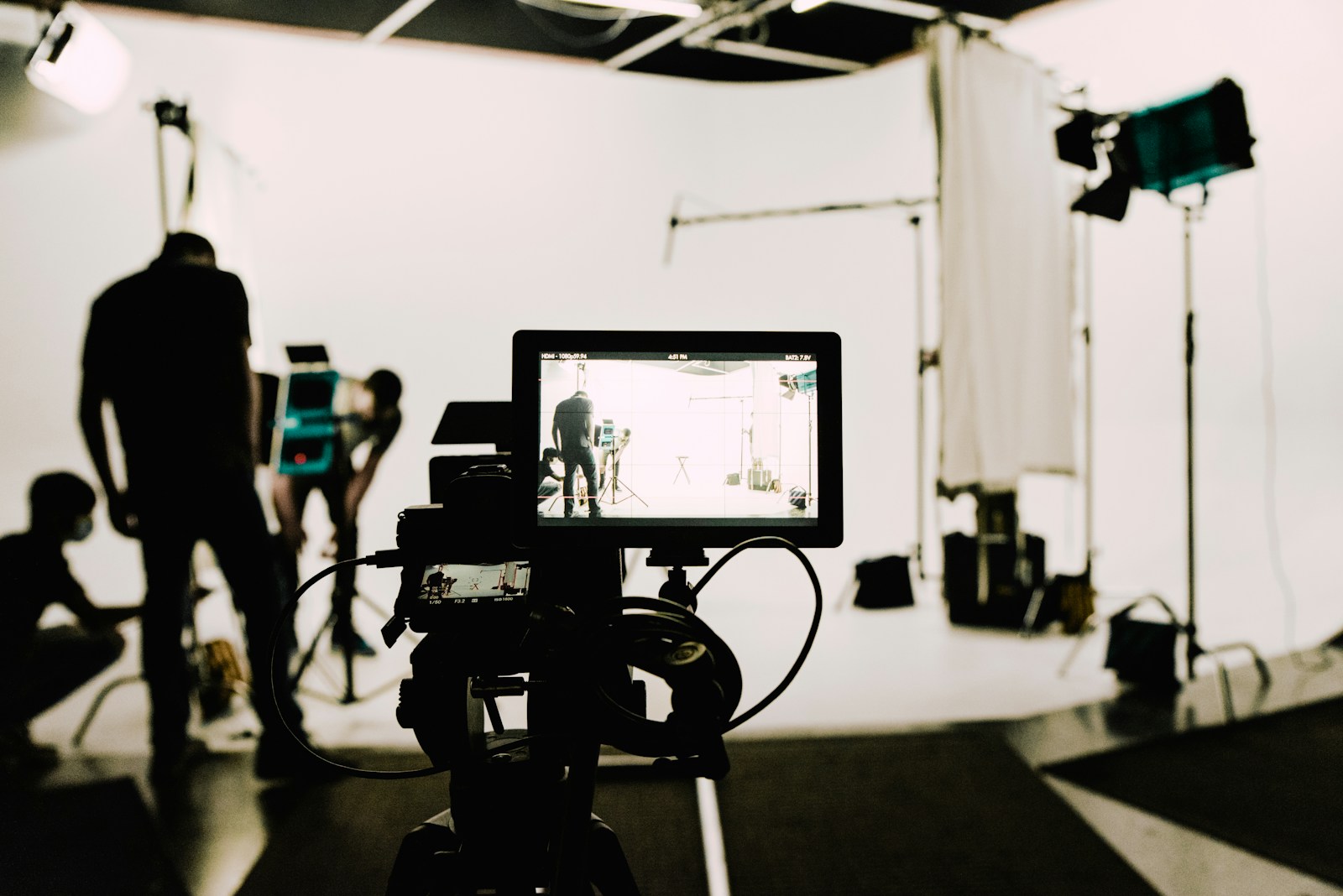 Camera against a white studio background