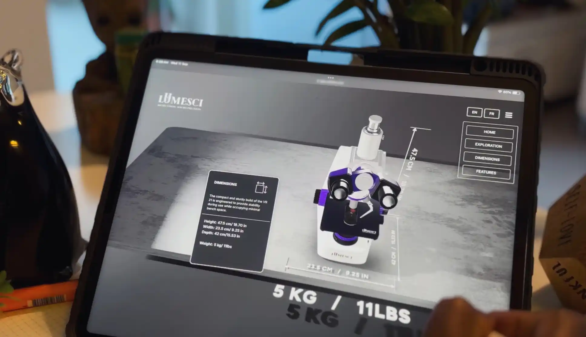 Microscope digital twin showing dimensions module with height, width, depth and weight overlays