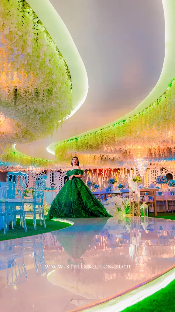 Debutante in green on the curved stage of Celestia Hall, Quezon City