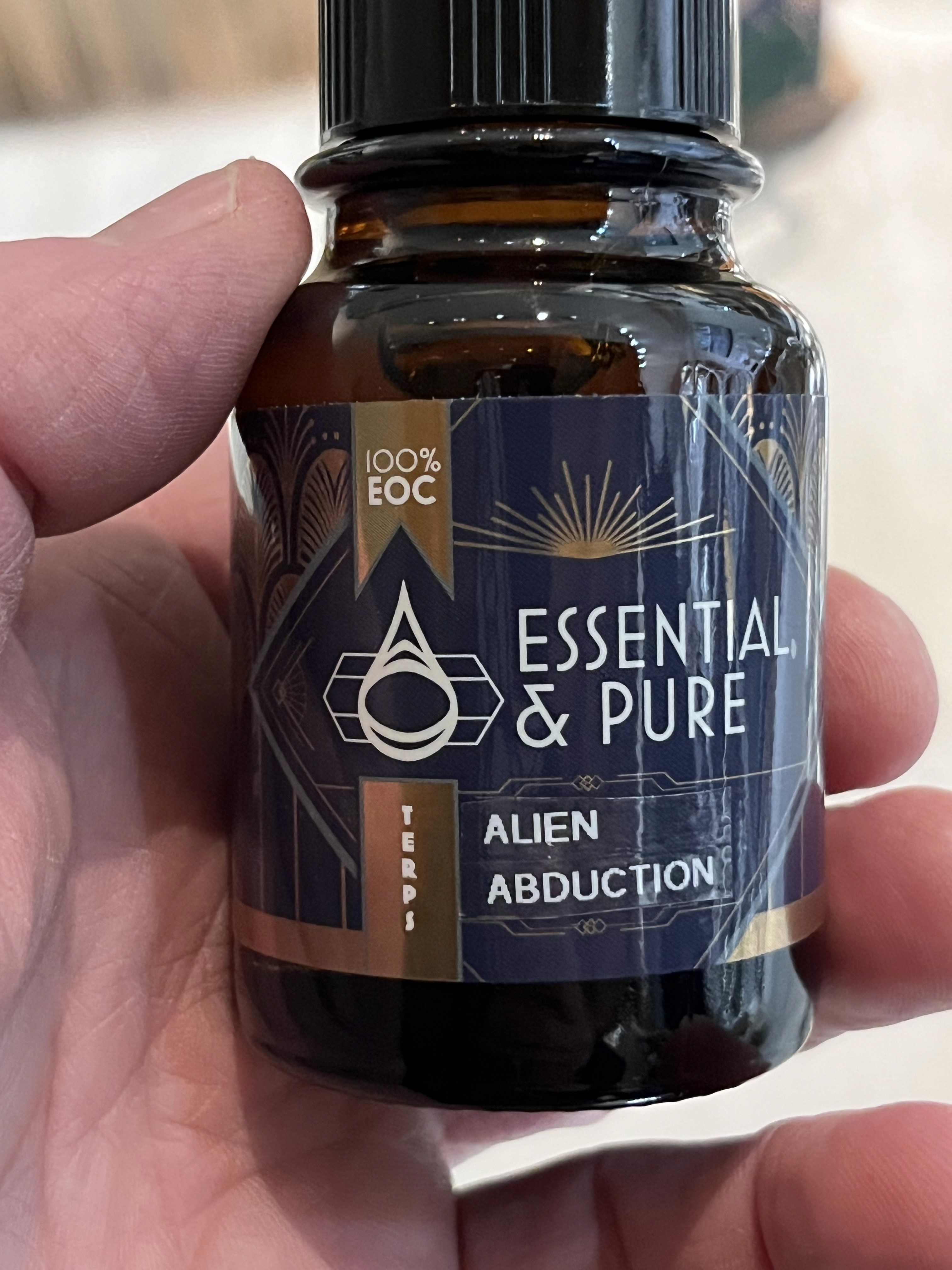 A man stading with Surfboard