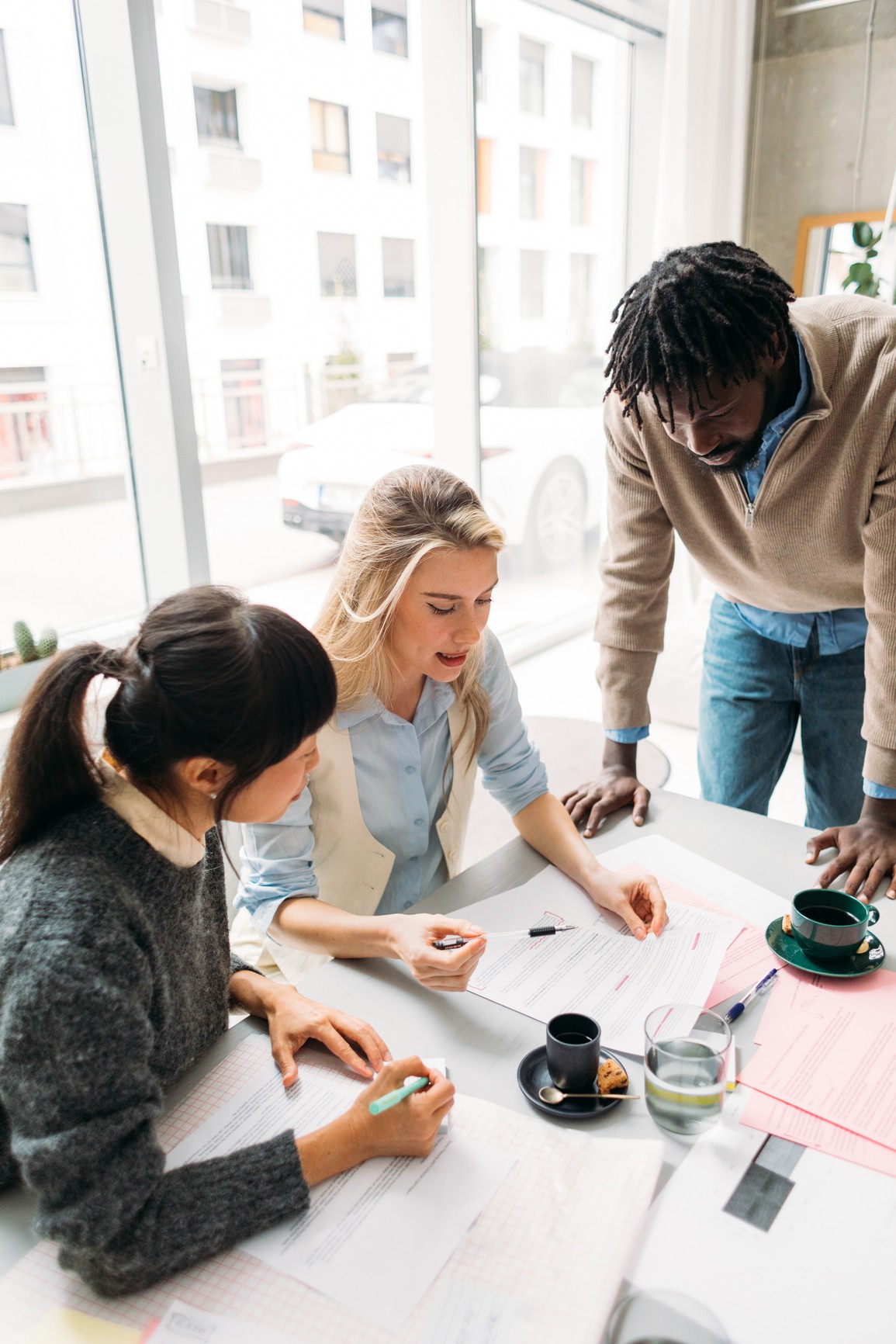 People reviewing documents