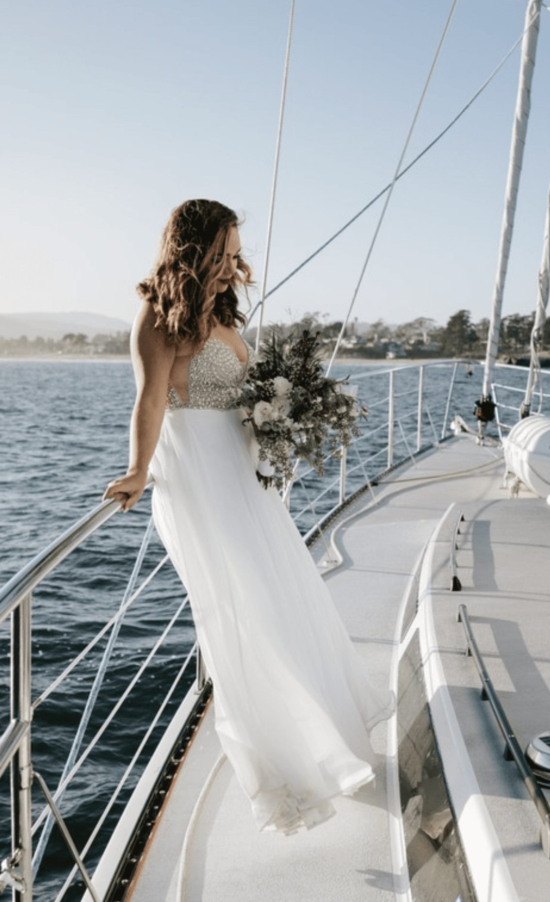 bride on a boat with flower bar design studio flowers