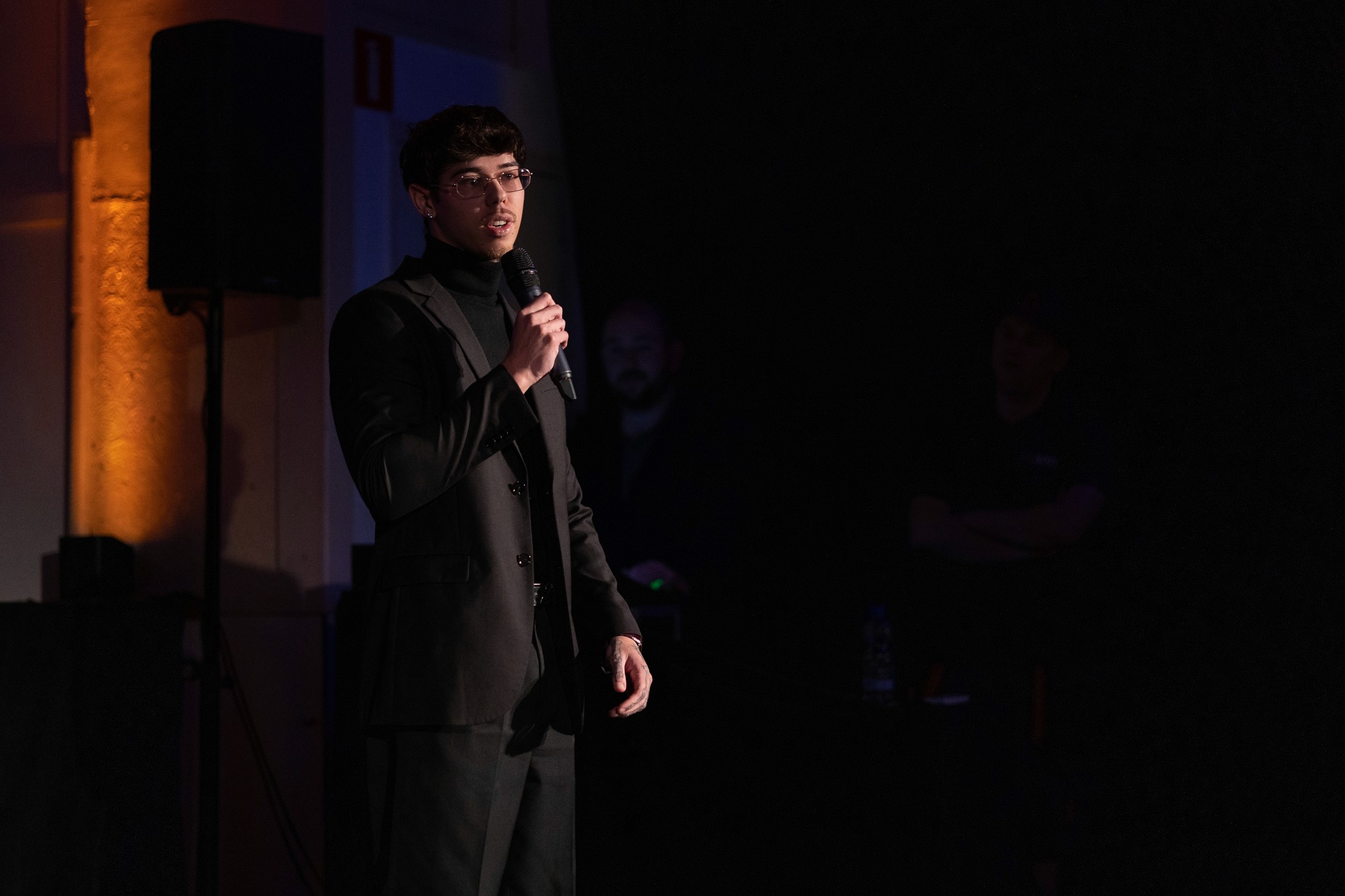 Group of men standing with Sufboard