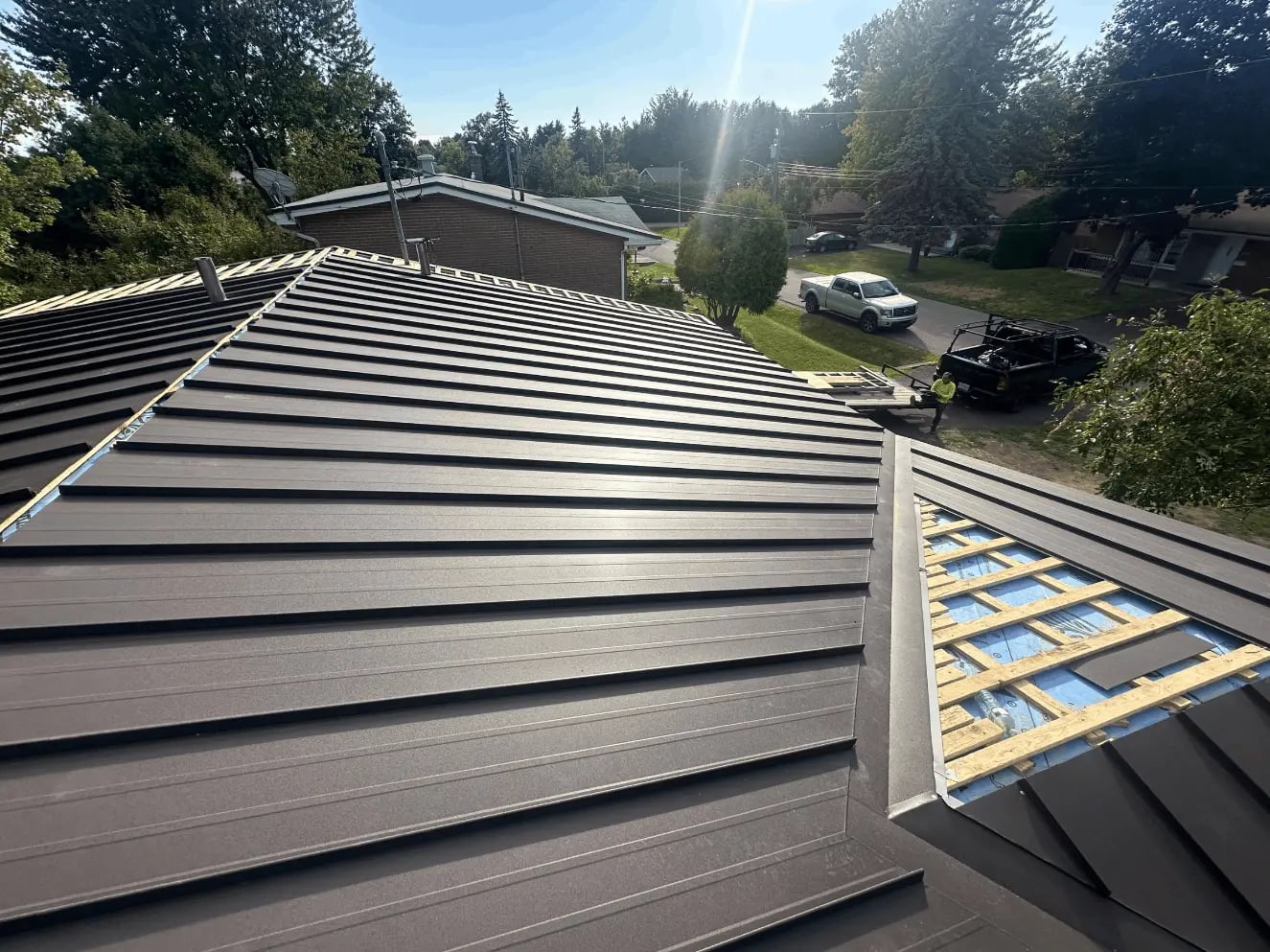 Maison avec toit métal à Joliette - garantie 50 ans