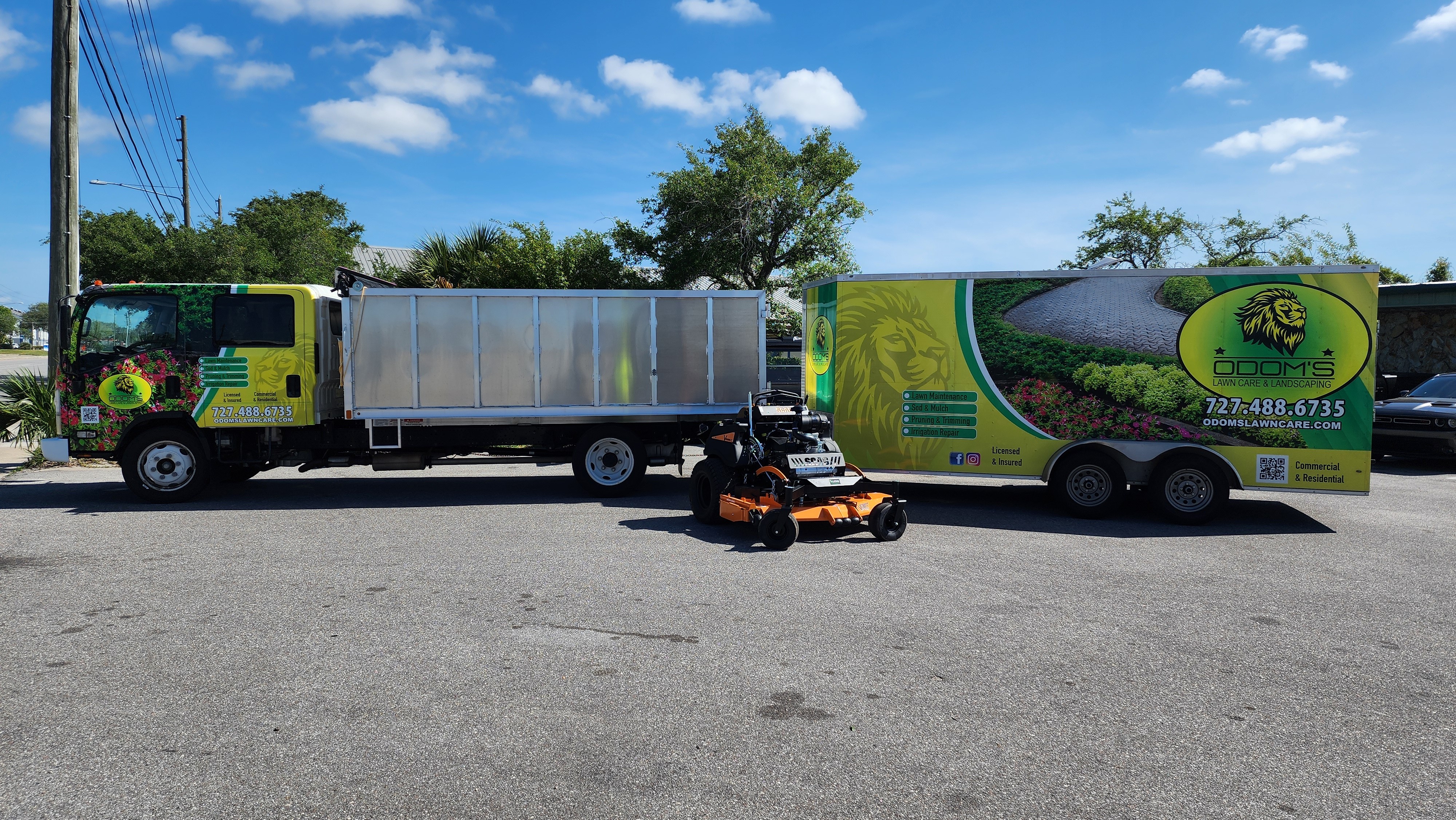 Free Framer Template - A group of professionals collaborating around a table in a modern office space with computers and creative decor.