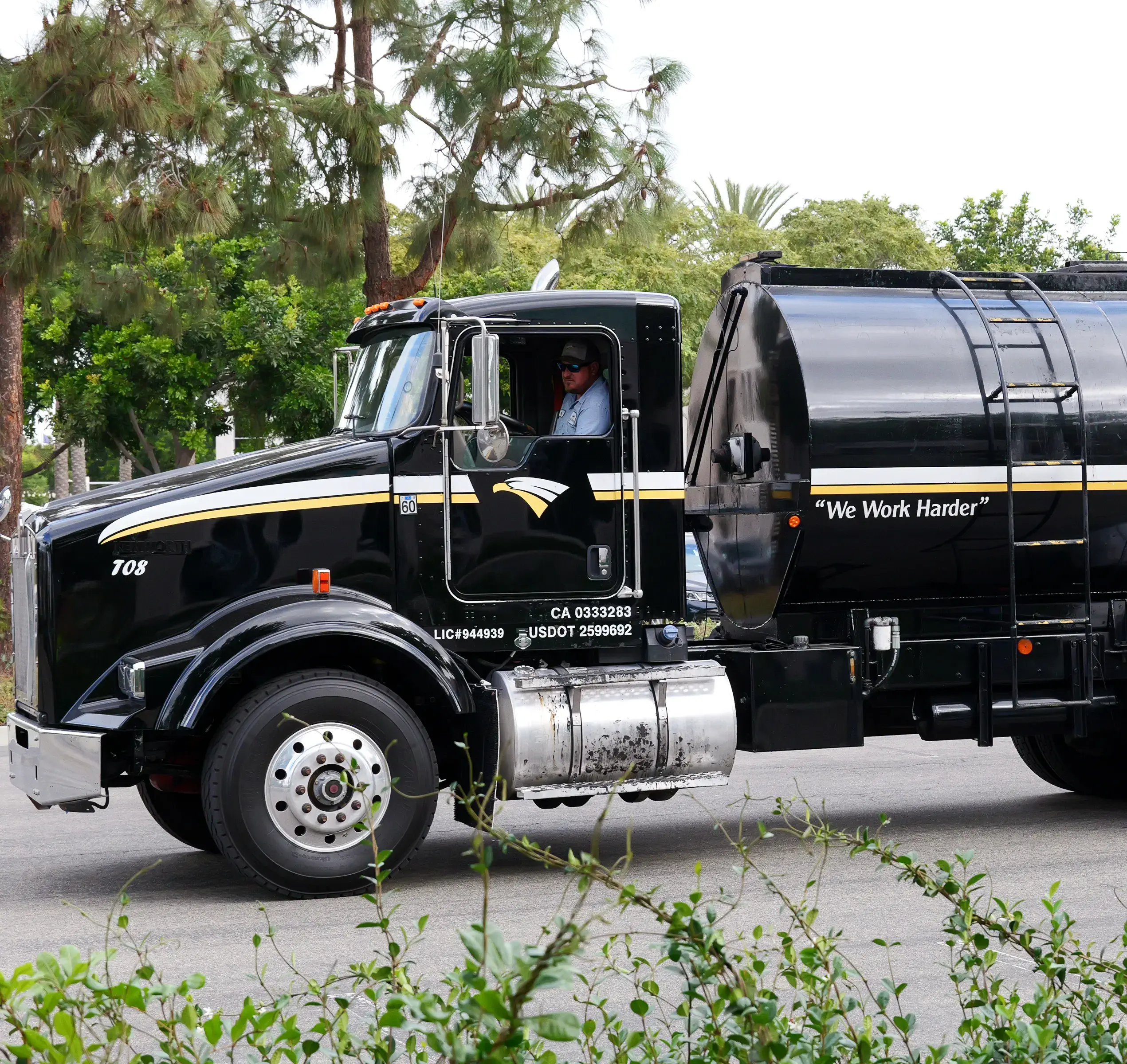 Seal coat tanker truck on a construction site