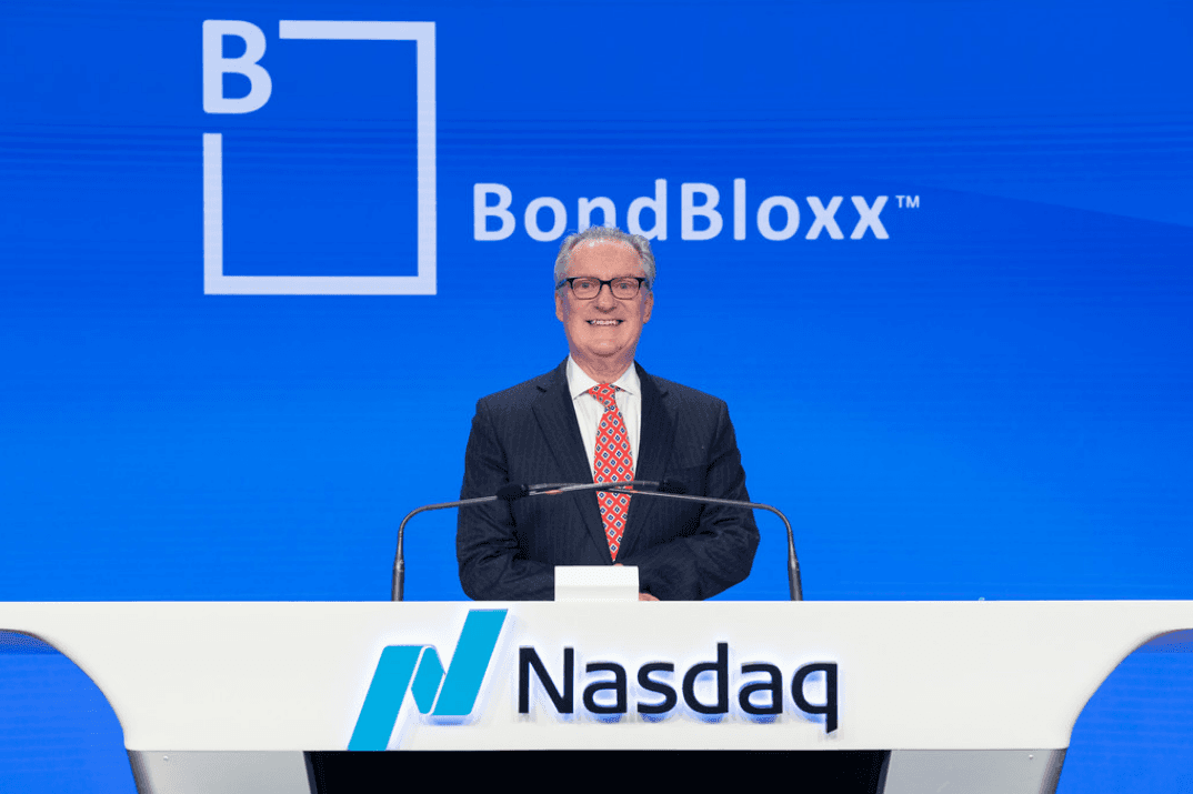 Professional man buttoning his jacket