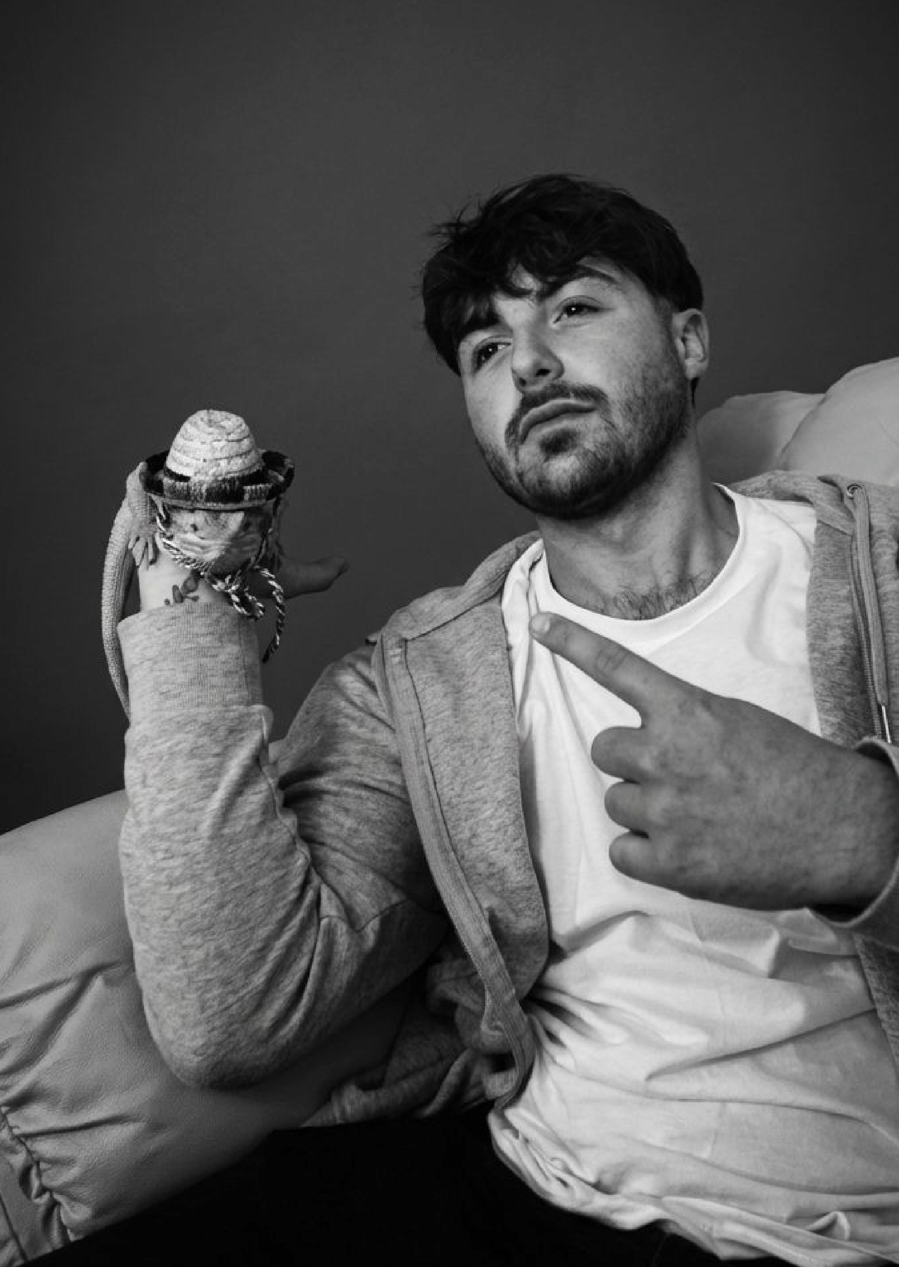 grayscale photo of woman in white and black stripe shirt
