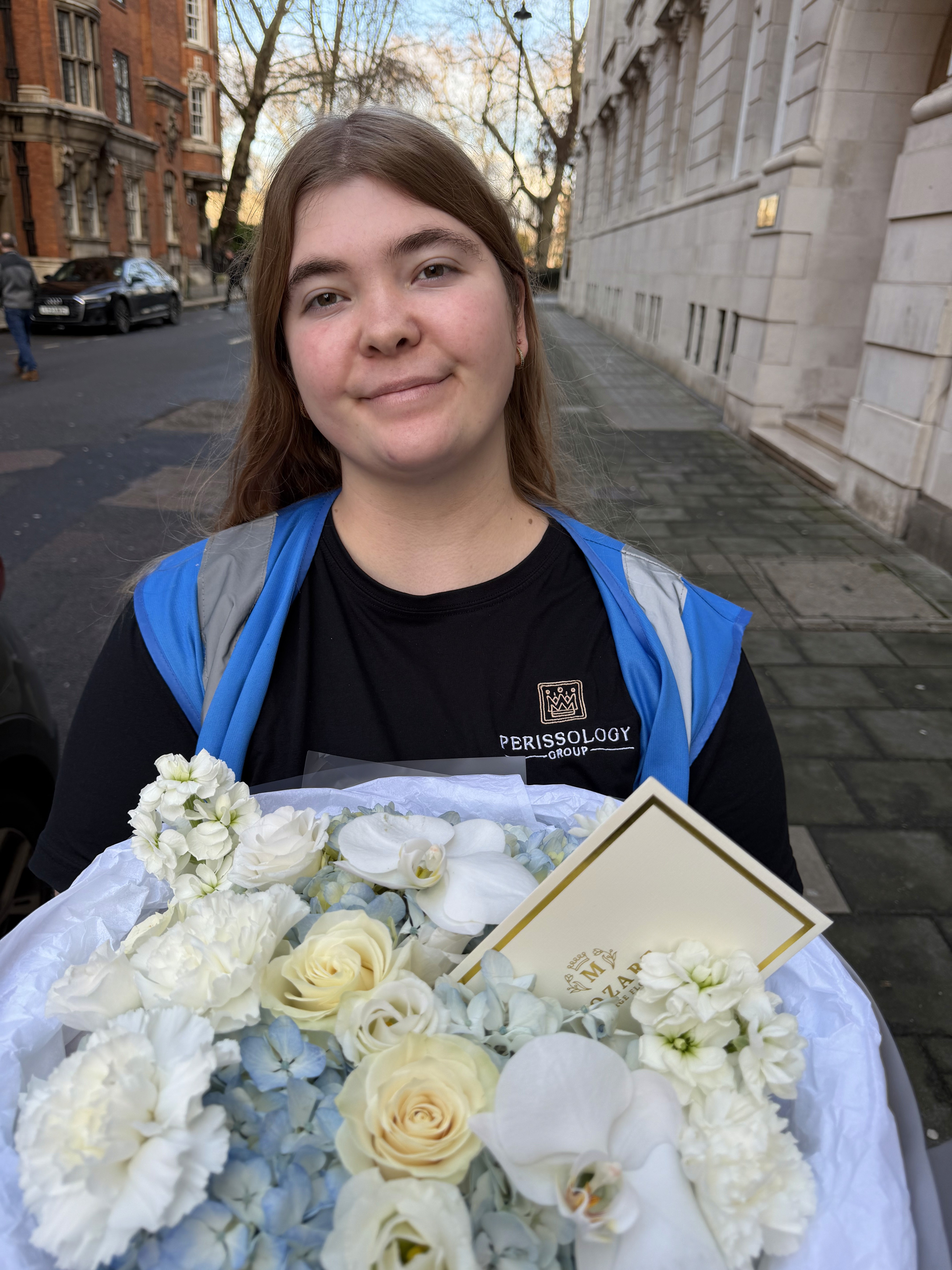 Perissology Courier Caitlin handling high value flowers