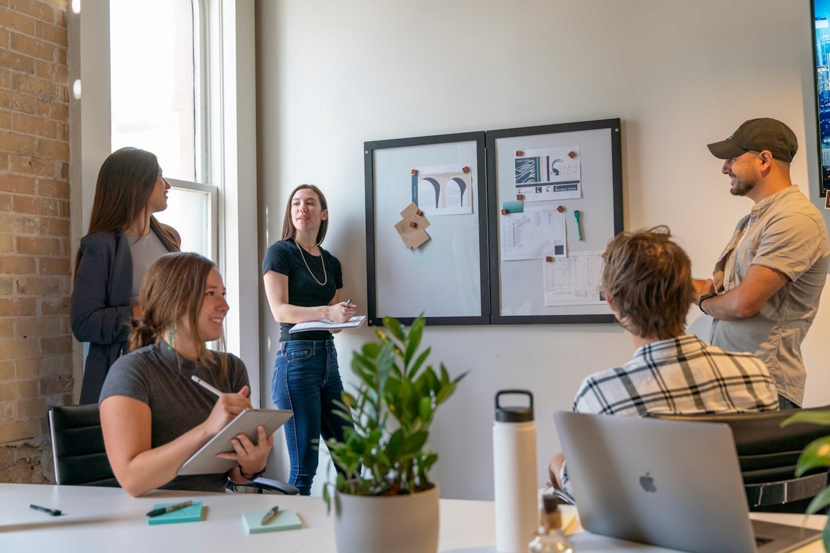 Consulting team discussing growth strategy in a modern office