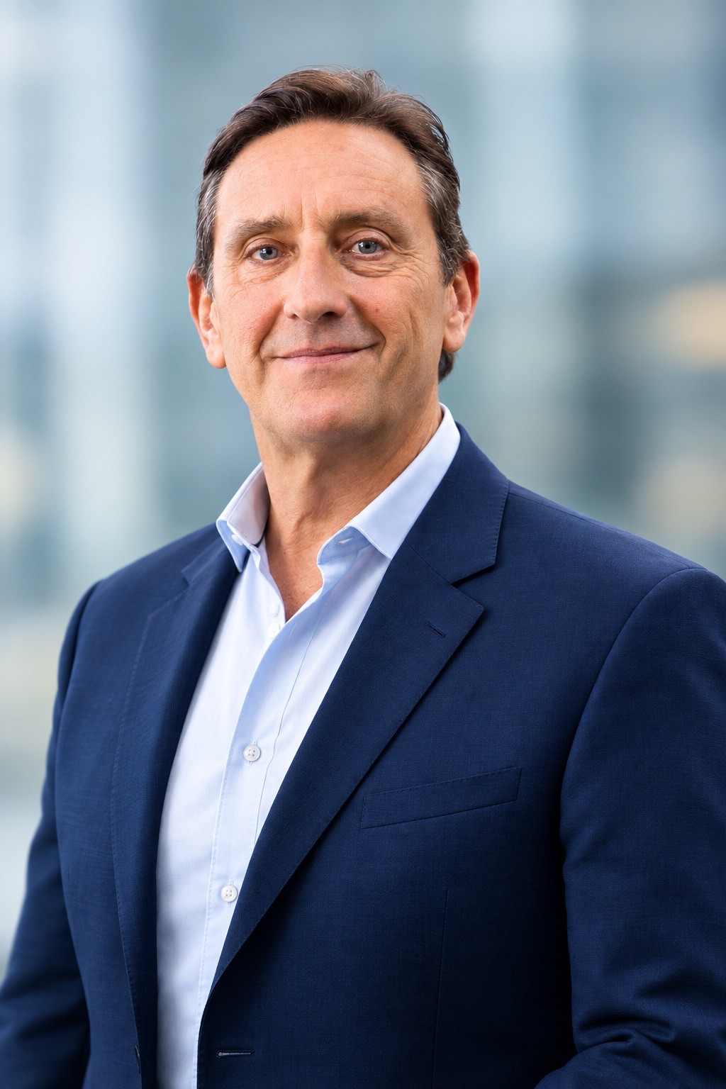 portrait photography of man wearing black suit jacket