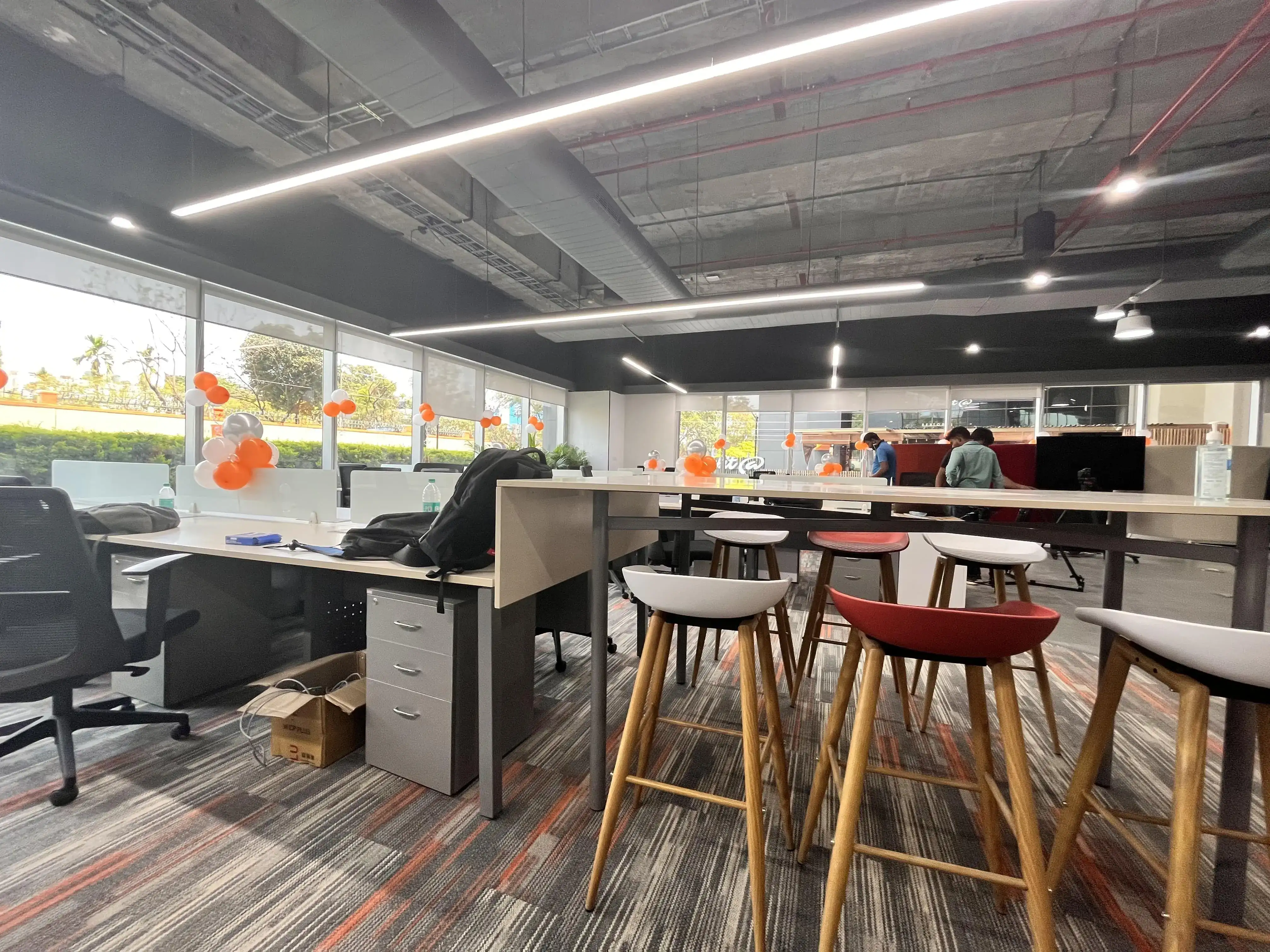 Open workspace with collaborative seating and workstations.