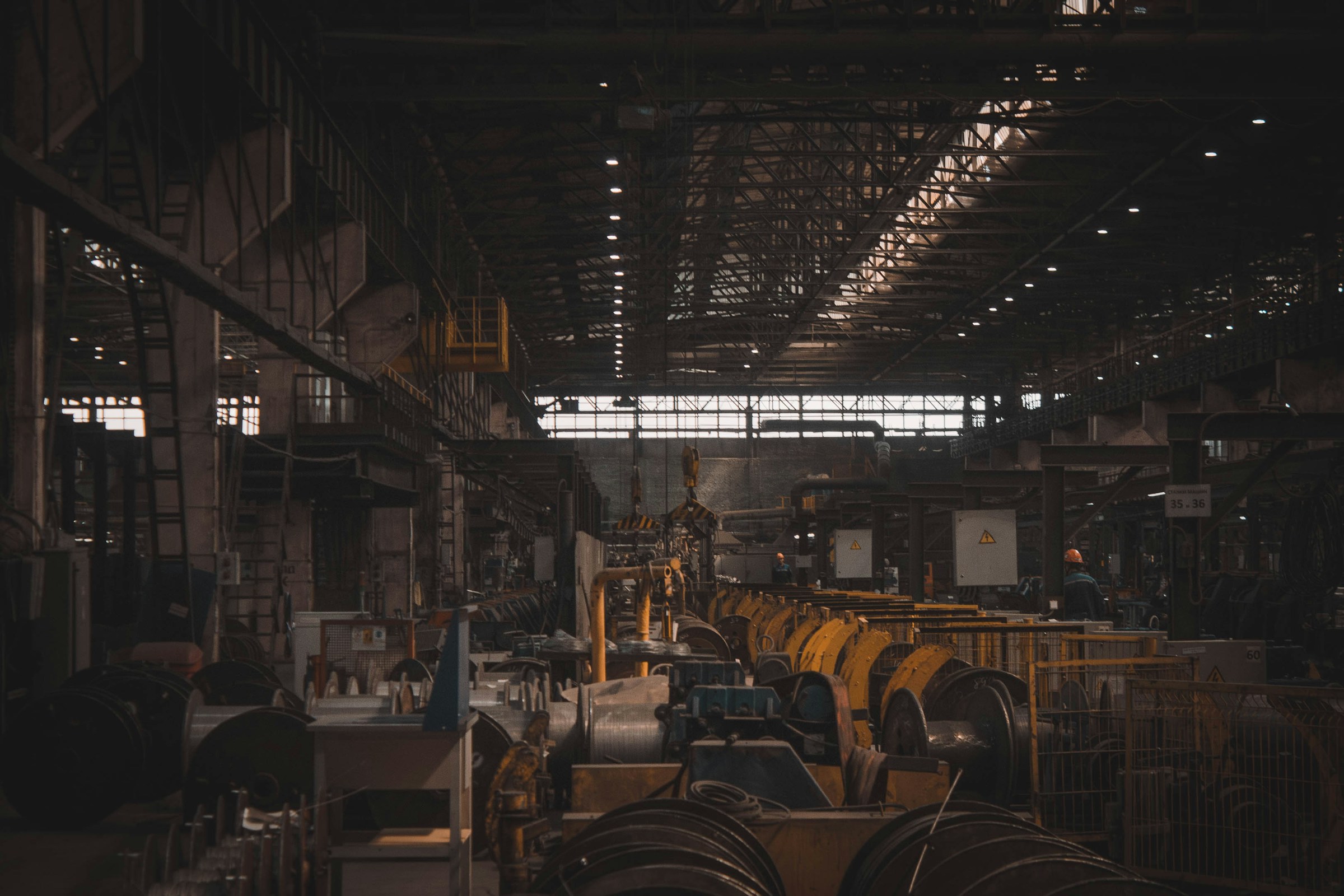 Machinery on a dimly lit factory floor