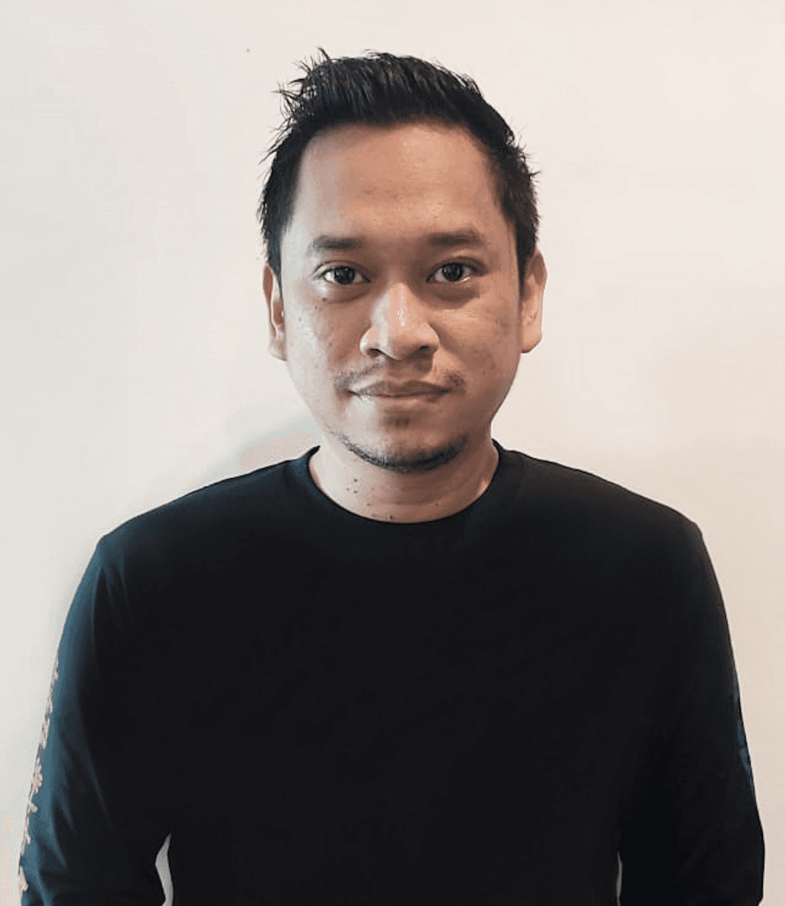 A silhouette of a person in the dark