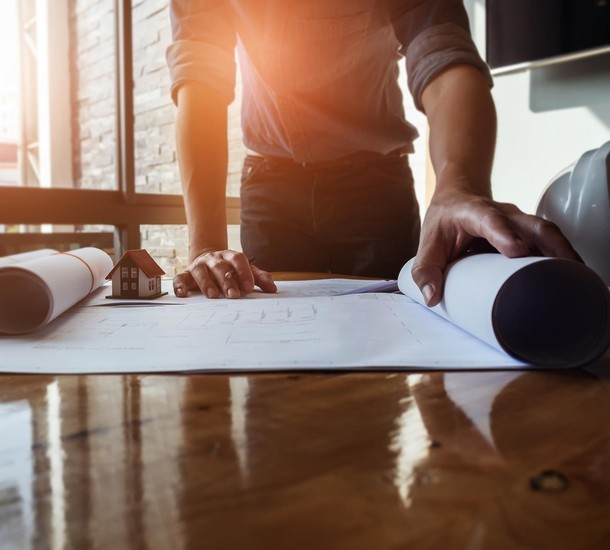 person sitting on chair using Surface