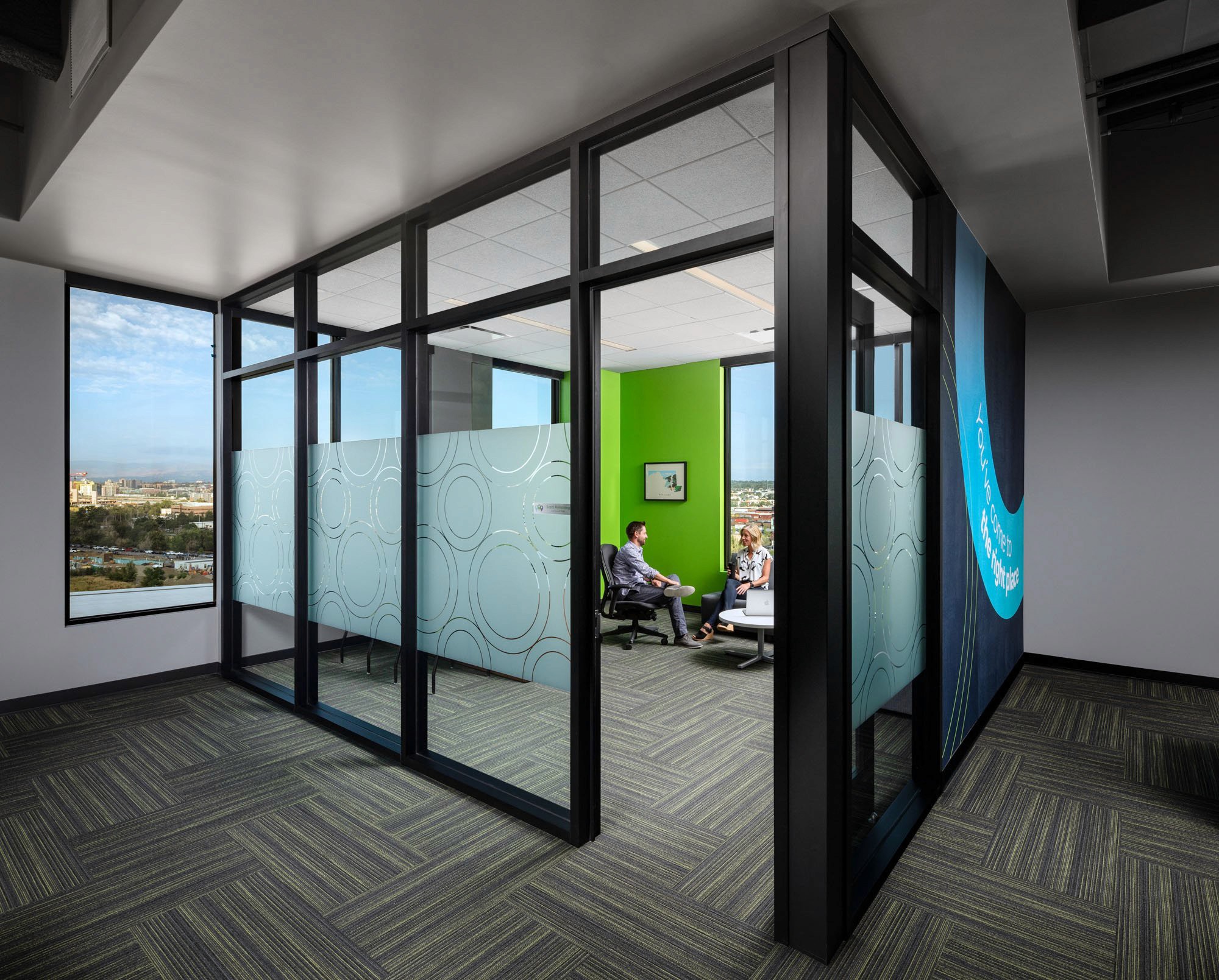 Modern office glass partition with meeting room.