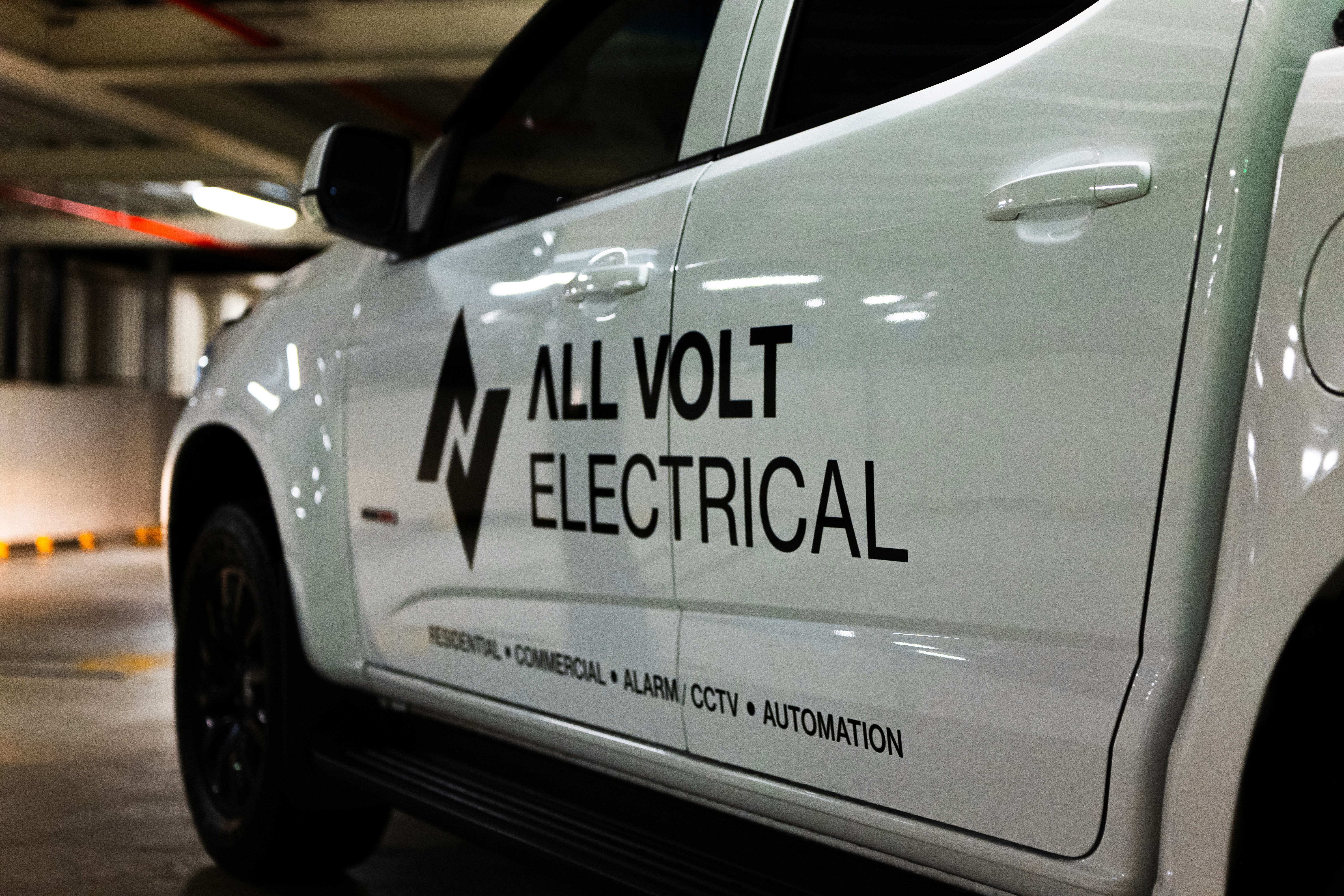 a living room with a couch a chair and a table