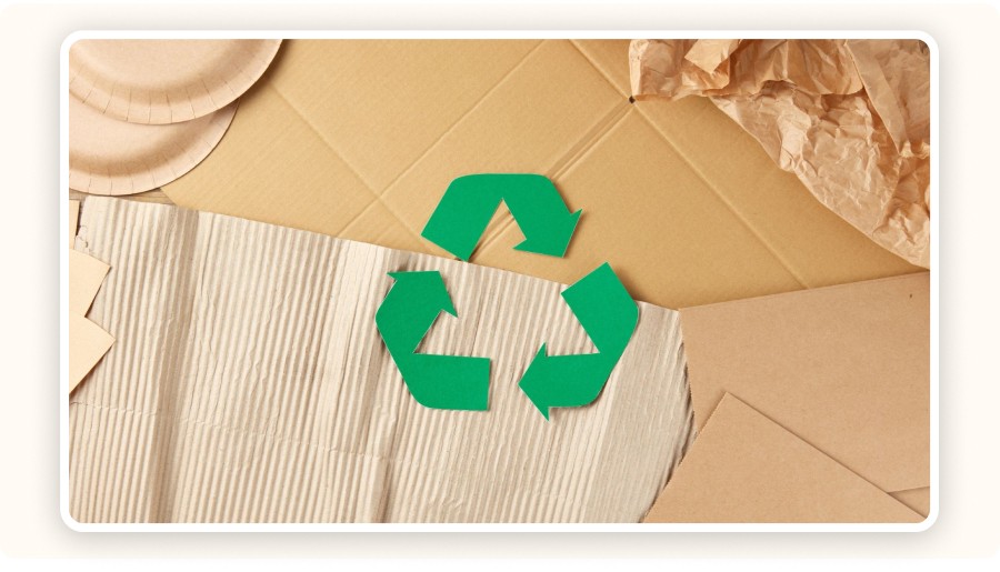 Green recycling symbols placed on boxes