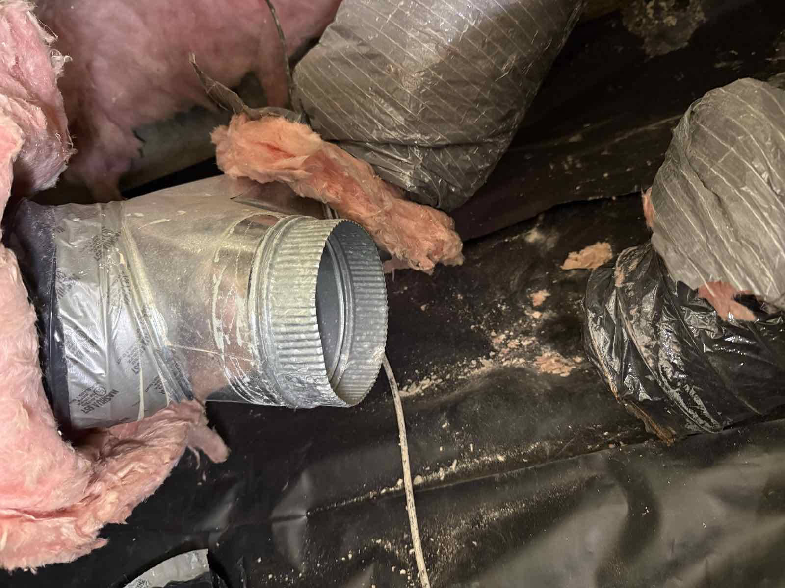 The duct wye on the 6-inch run, under the master bedroom.