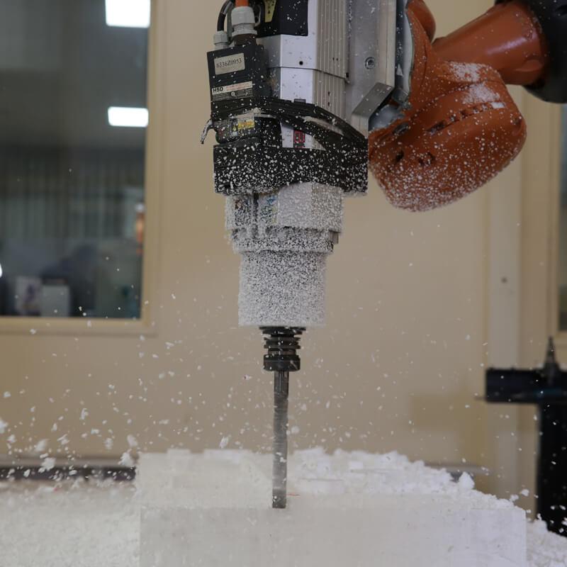 Robotic machining of large-format tooling.