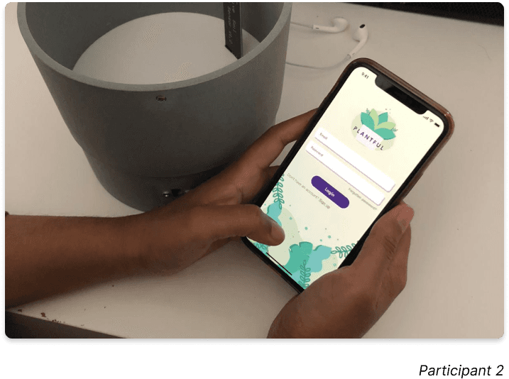 Phone in hand with plantful app participant 2