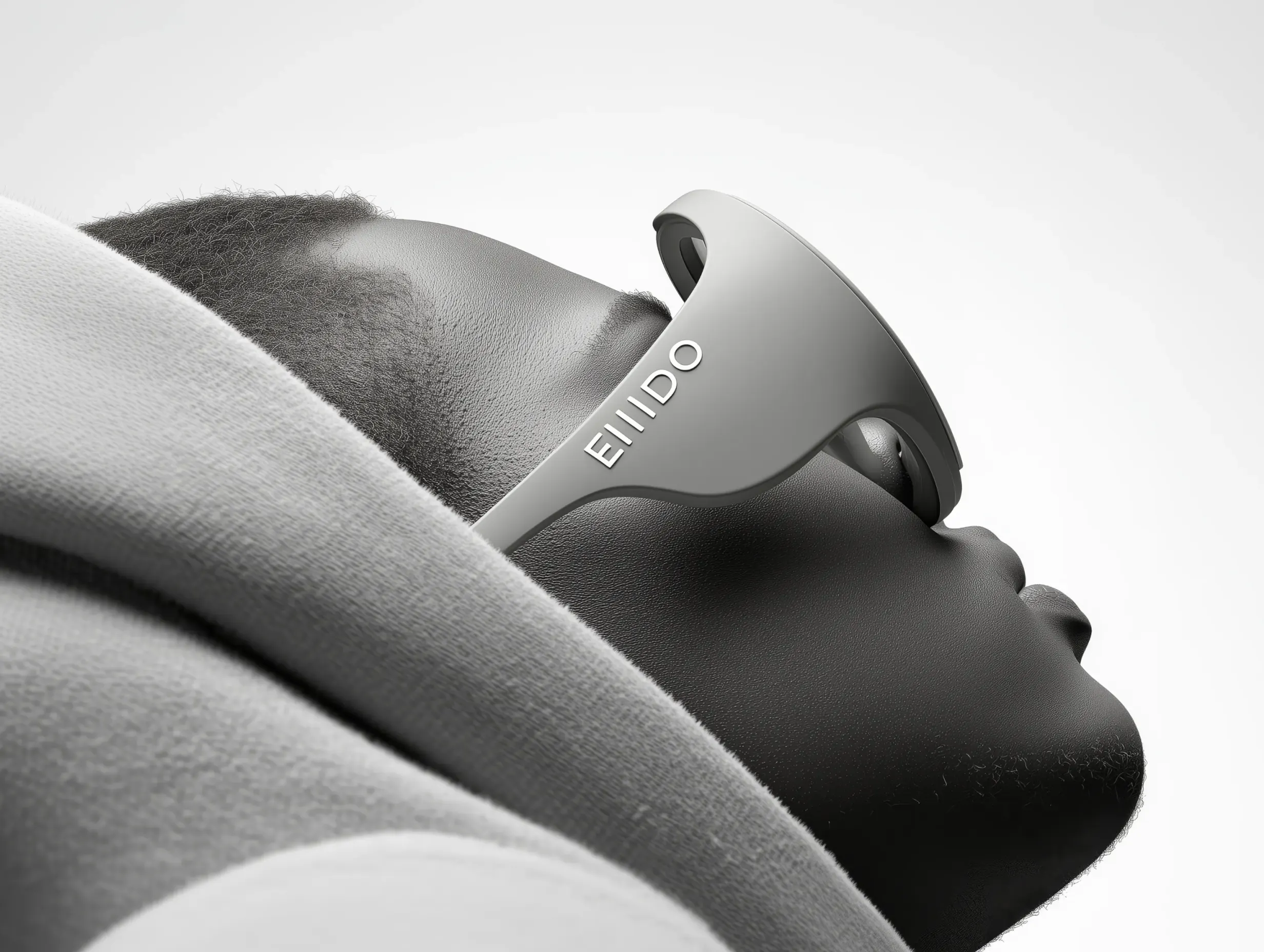 Close-up portrait of a model wearing Eiiido smart glasses in a minimalist studio setting.