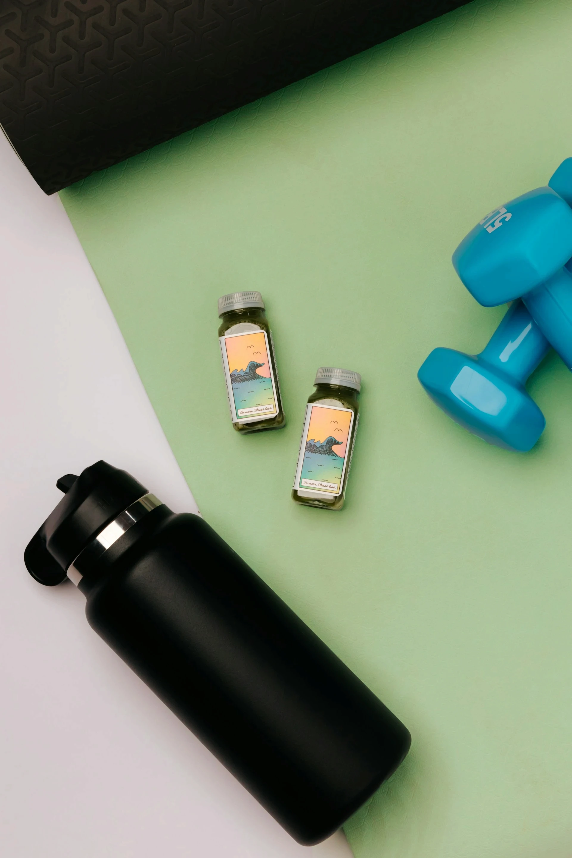 a black bottle in a gym context