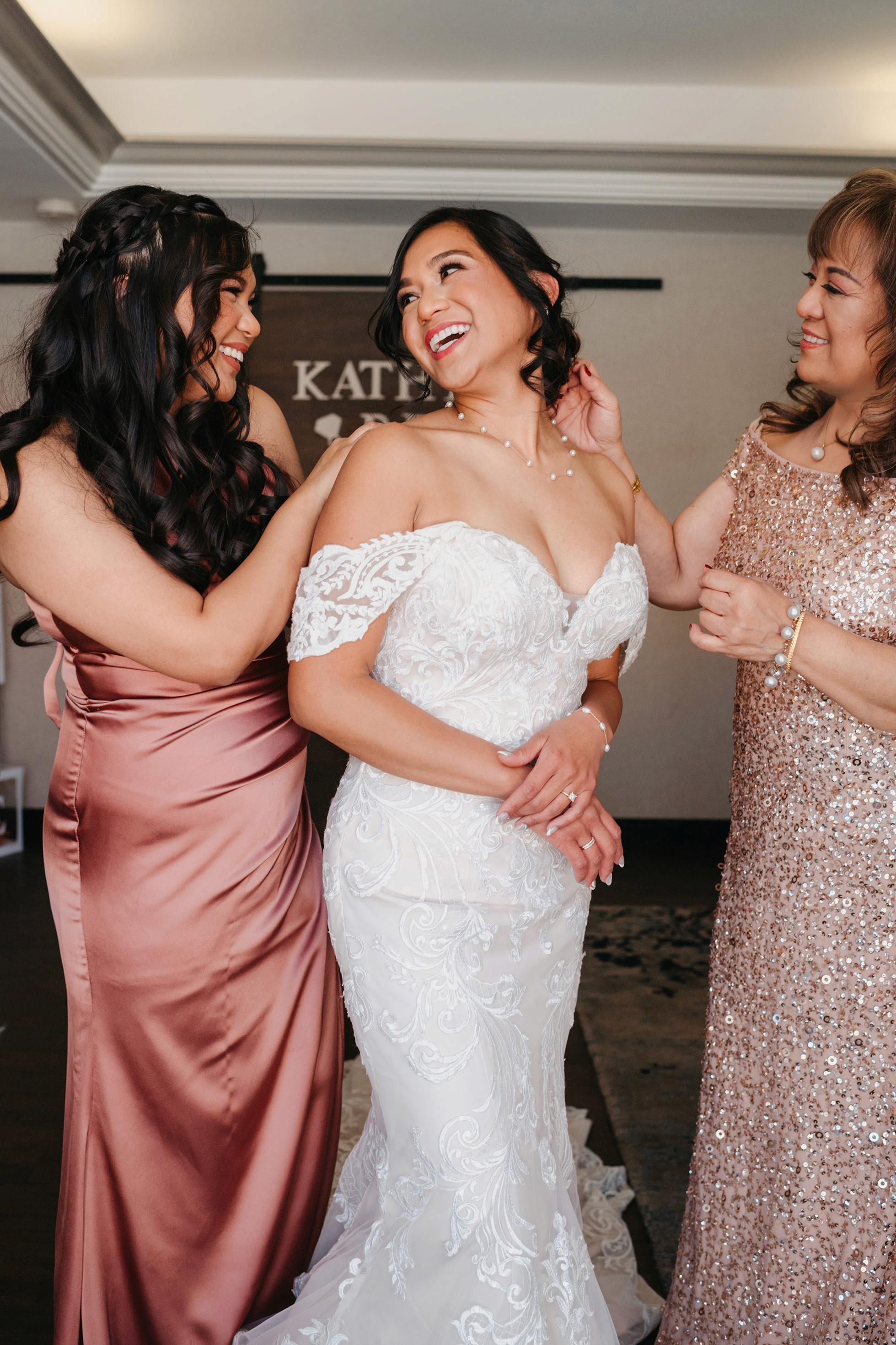 Bride getting final touches before leaving for the ceremony