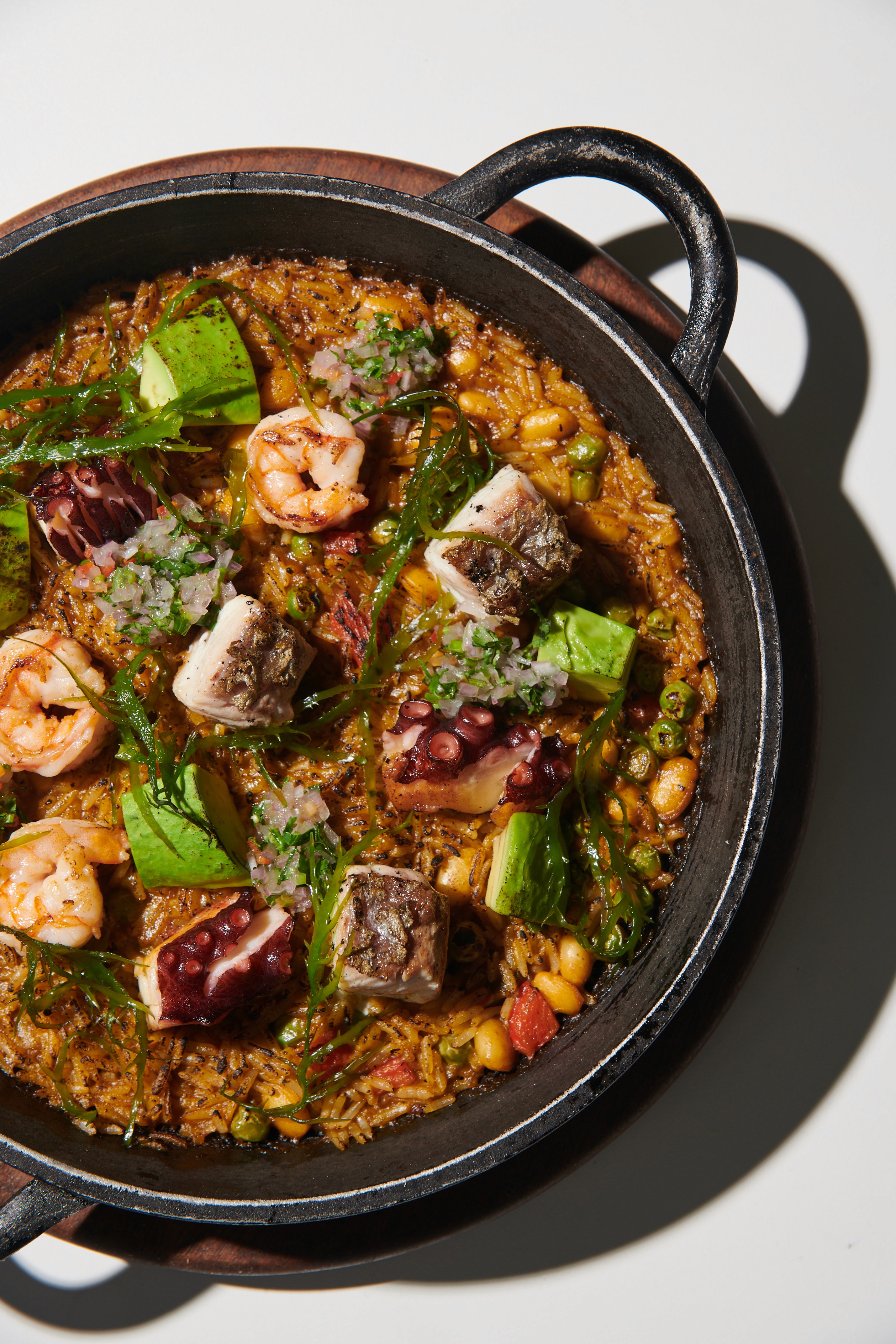 a plate of food and a glass of wine