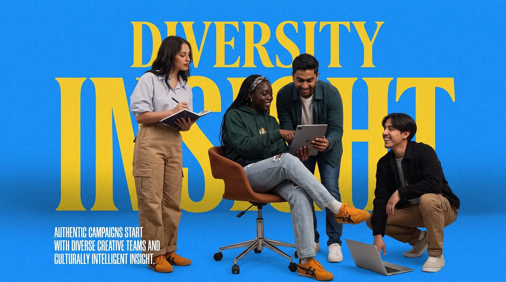 Diverse creative team collaborating on tablet and laptop - authentic campaigns start with diverse teams BAME representation