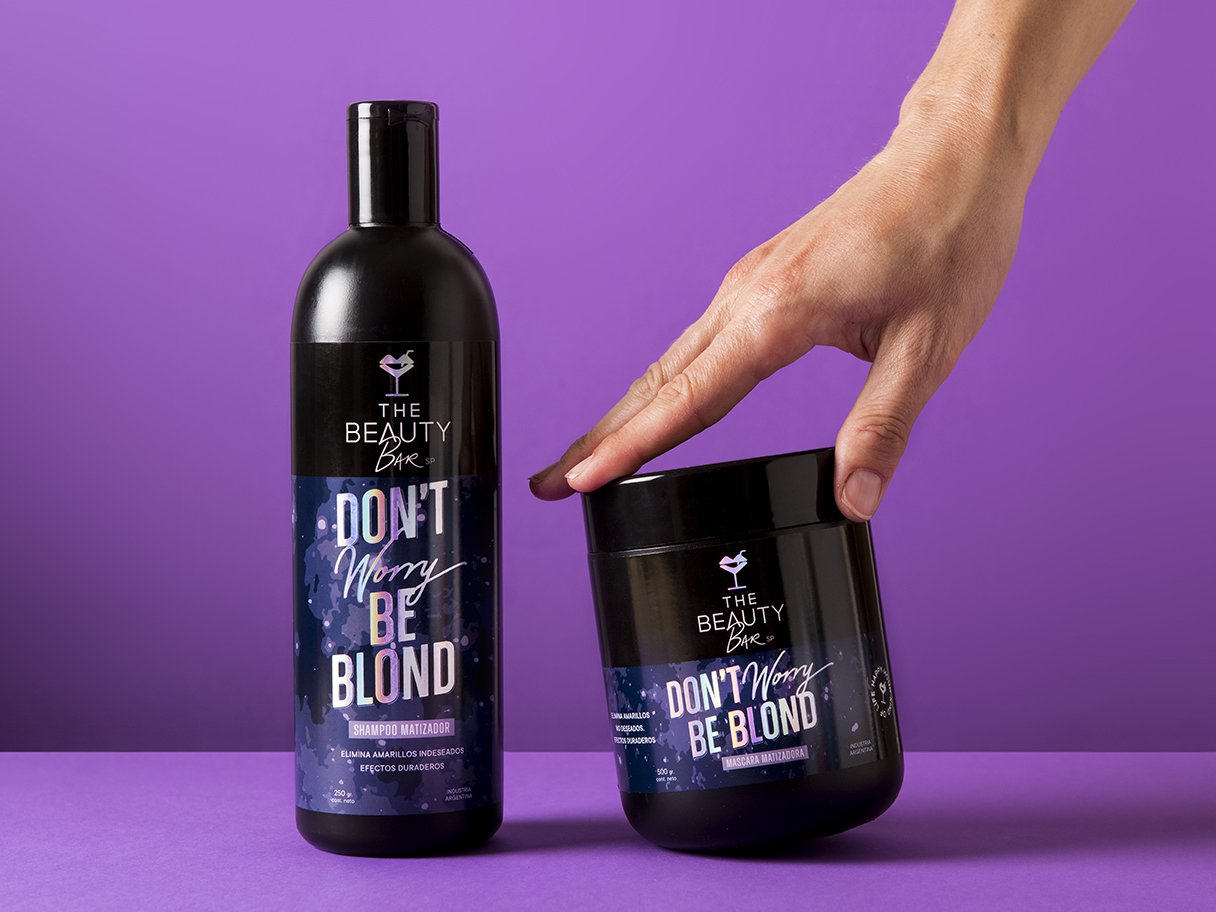 Rustic cabin in a golden field at sunset