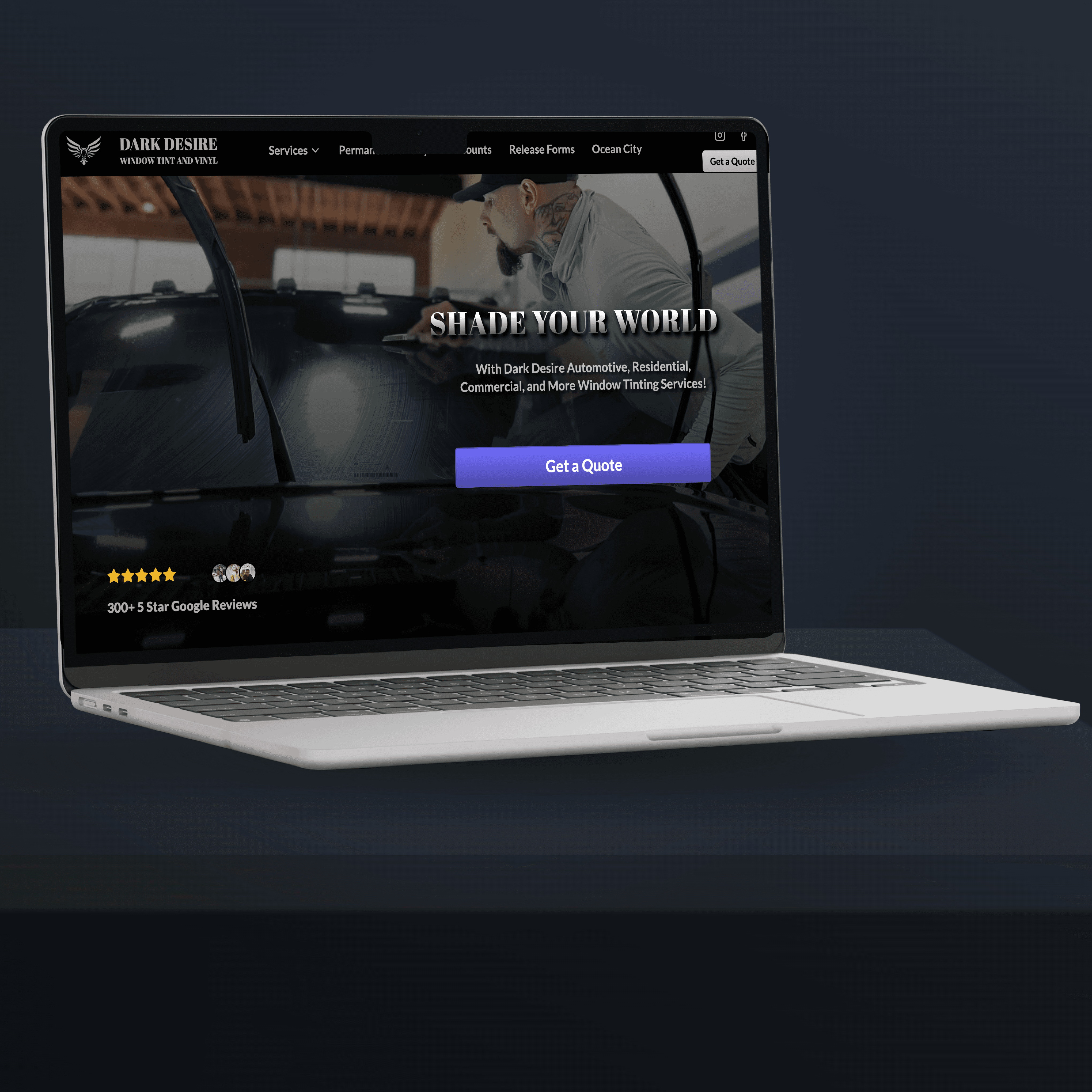 Dark Desire's website displayed on macbook