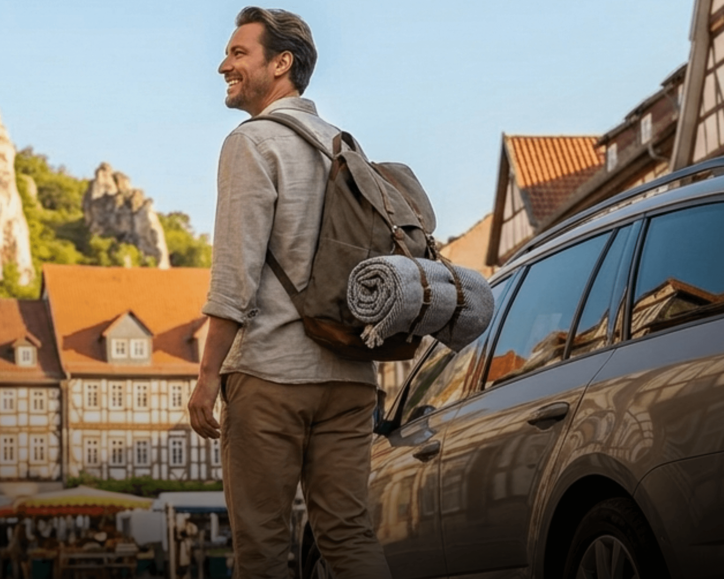two people looking at a tablet and smiling