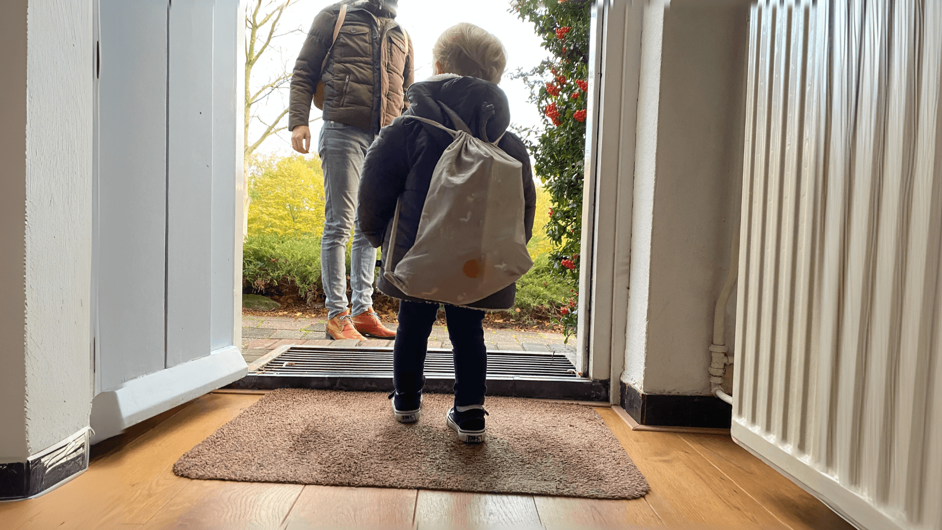 lady checking her phone and smiling
