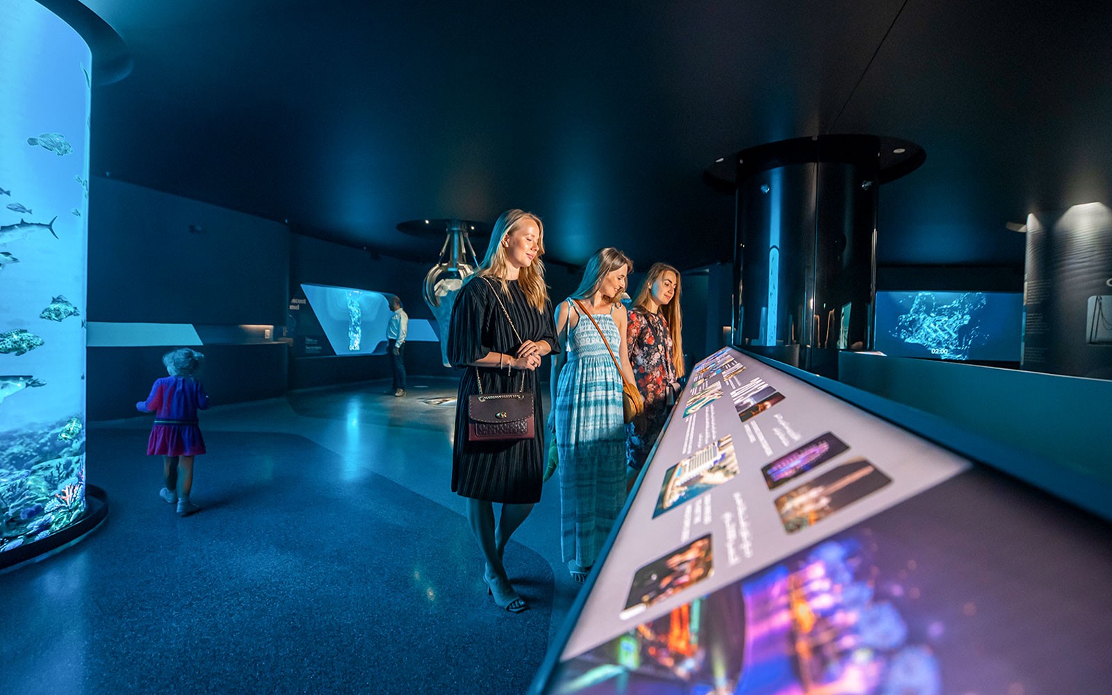 Visitors exploring interactive displays at The View At The Palm, Dubai.