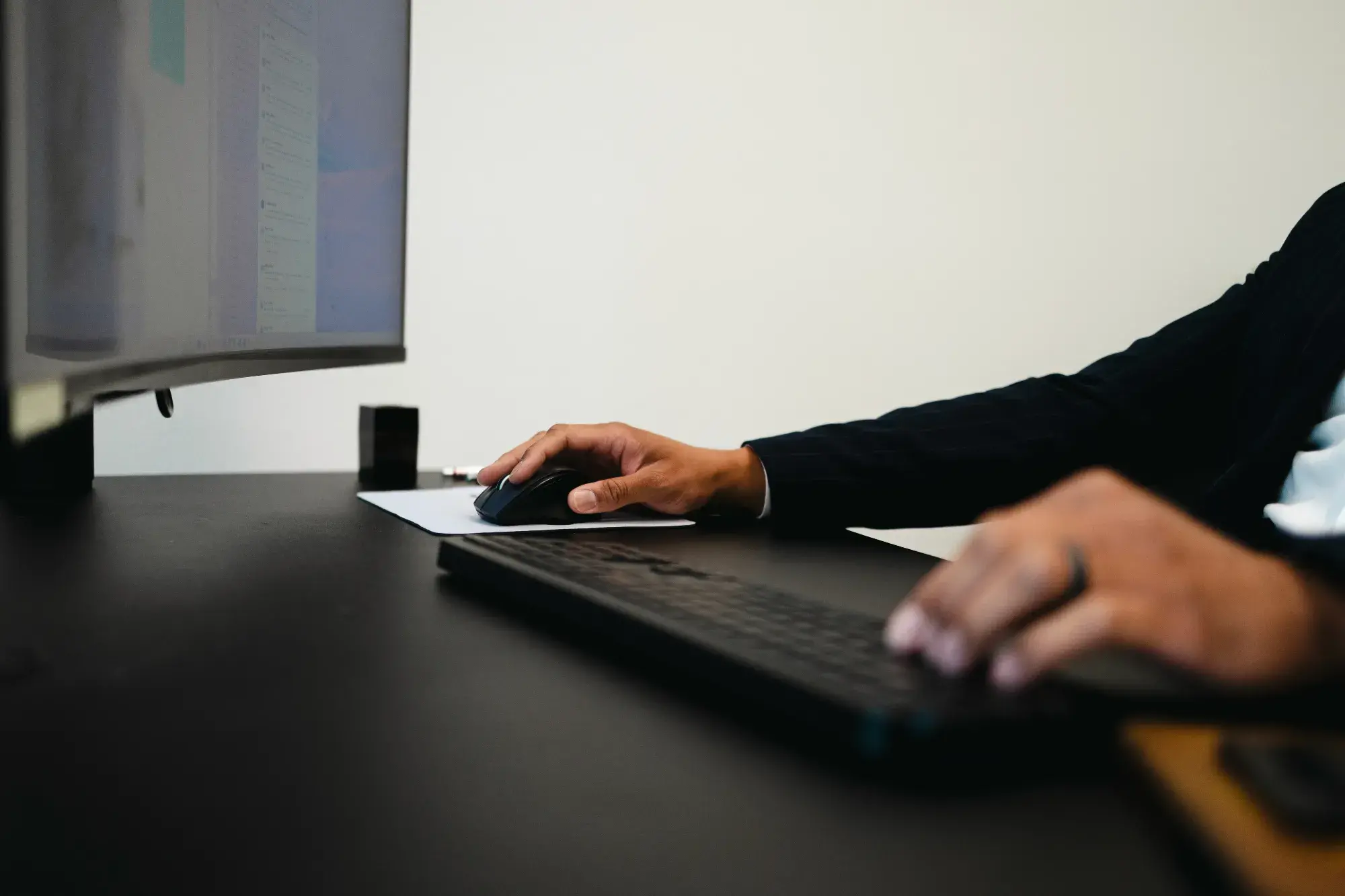 Chris Lewis typing on a keyboard