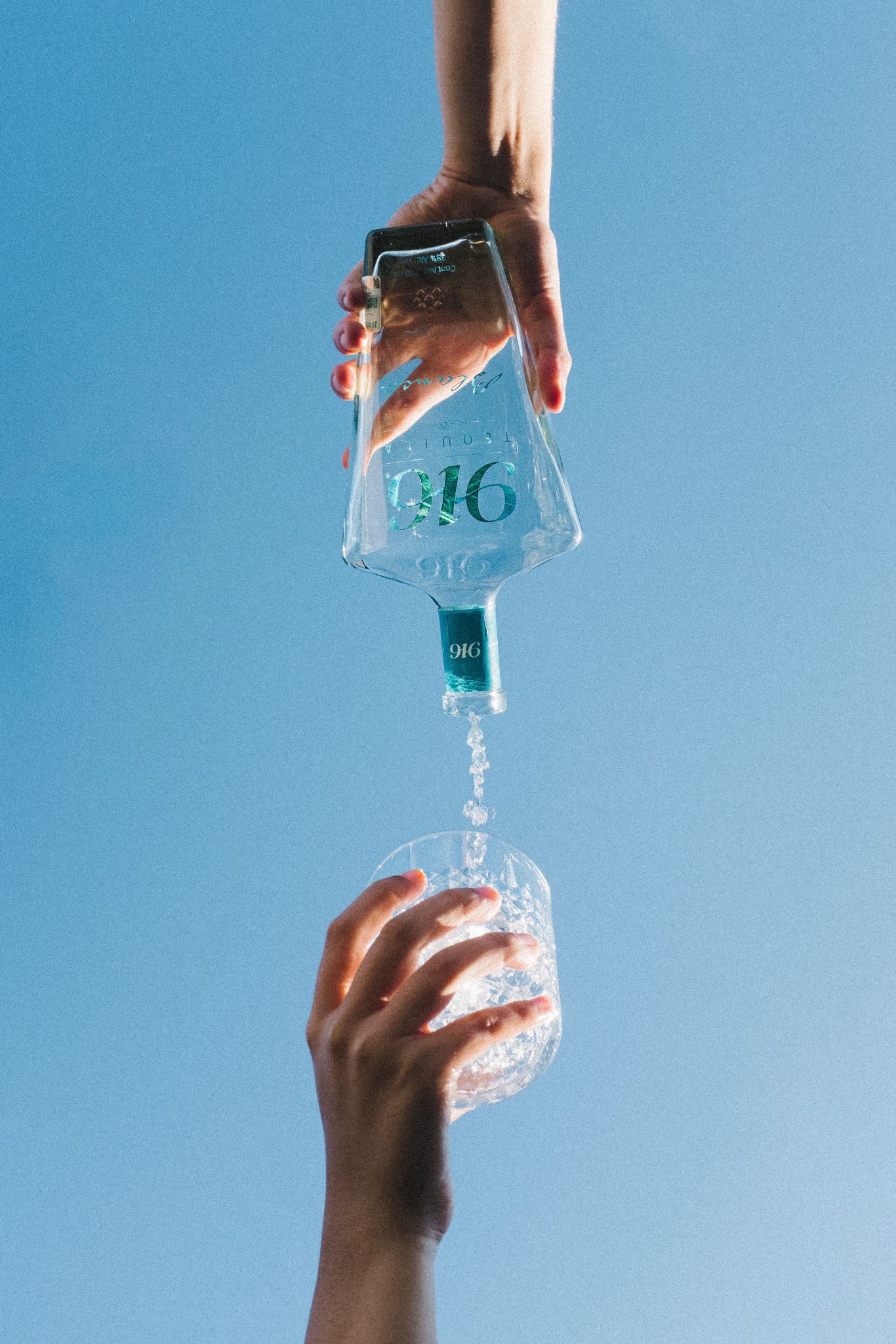 A-frame wooden villa surrounded by trees, glass facade reflecting nature, modern premium living.