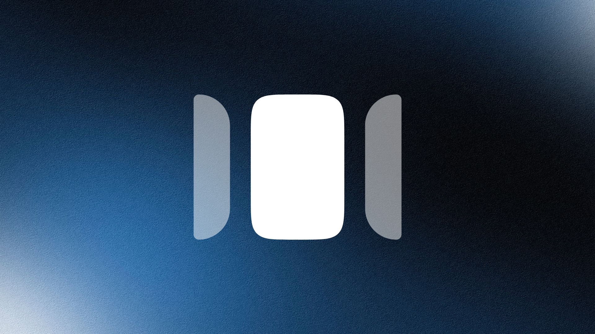 Man wearing a beige cap and dark shirt working on a laptop at a wooden desk with a plant in the background.