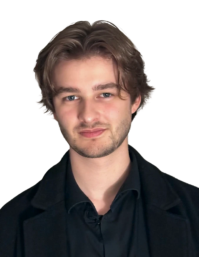 Portrait of Niels Vanderstraeten, wearing a black button-up