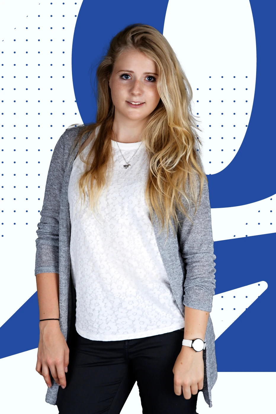 An image of a blonde girl standing against blue and white background with light smile and l