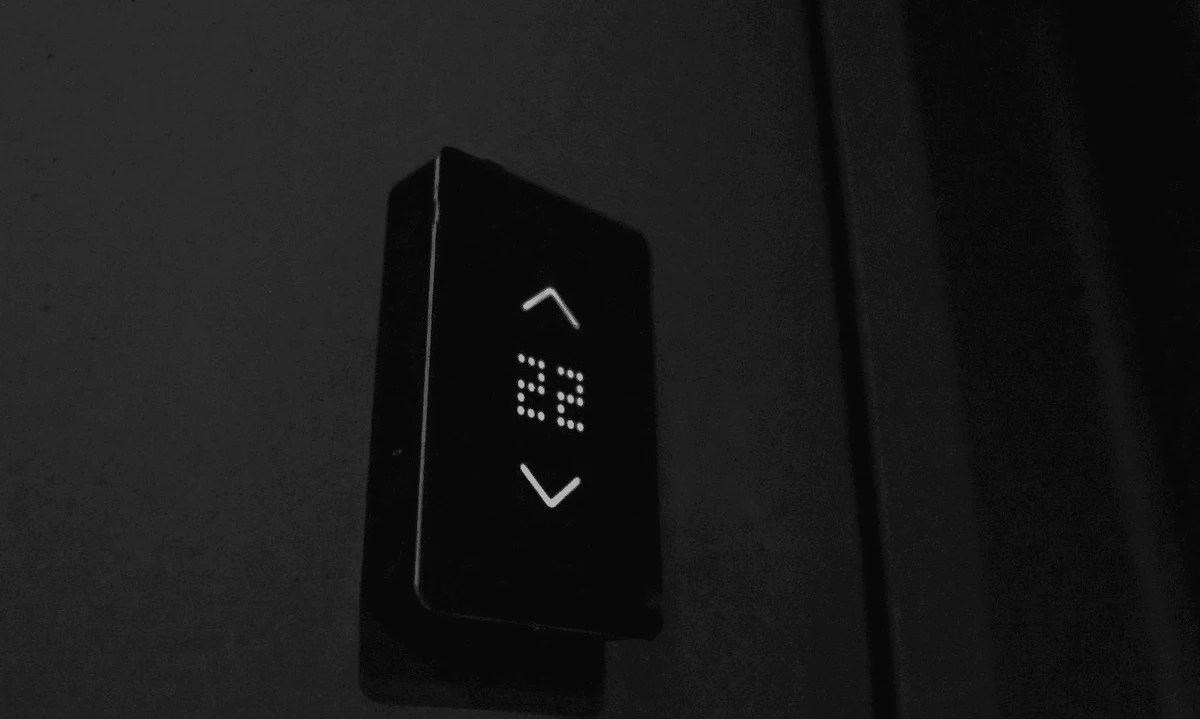 Smart home gym control panel managing lighting and audio systems as part of a fully integrated custom gym build in Canada.